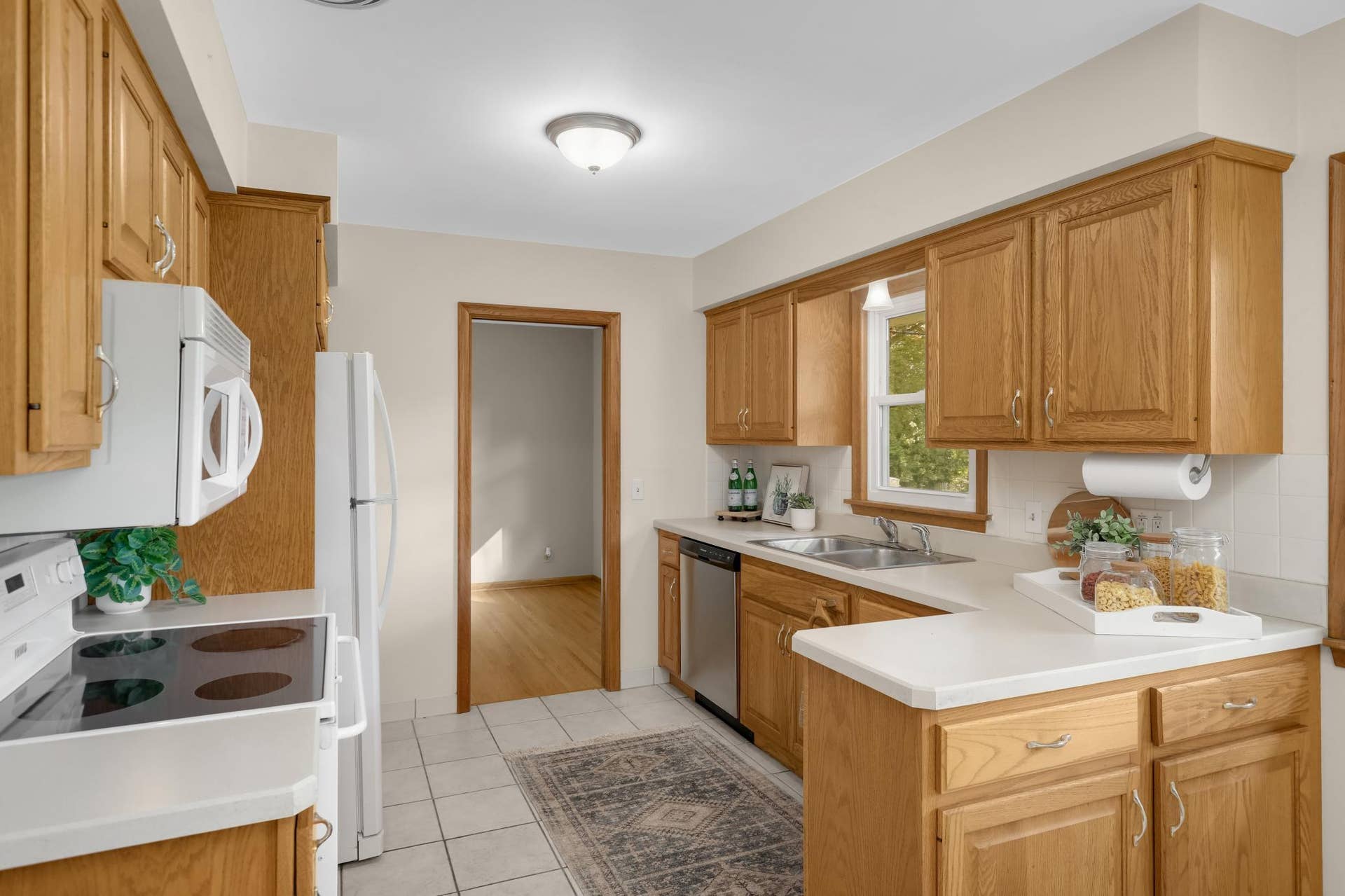 3829 Oak Street N, Brooklyn Center, MN 55429 Enjoy updated appliances, tile floors, and real wood cabinetry.