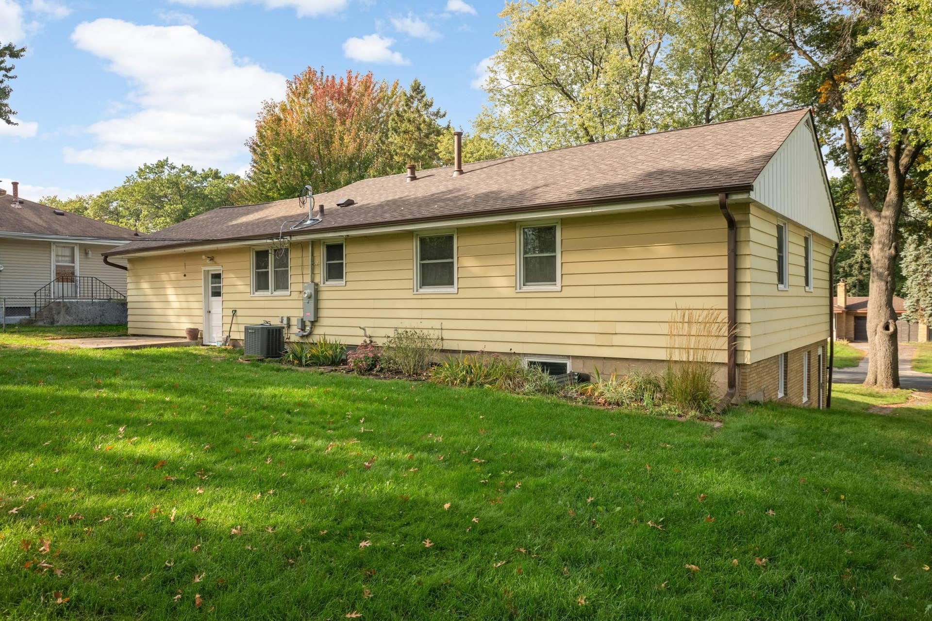 3829 Oak Street N, Brooklyn Center, MN 55429 Enjoy a flat backyard with plenty of room for pets and playing.