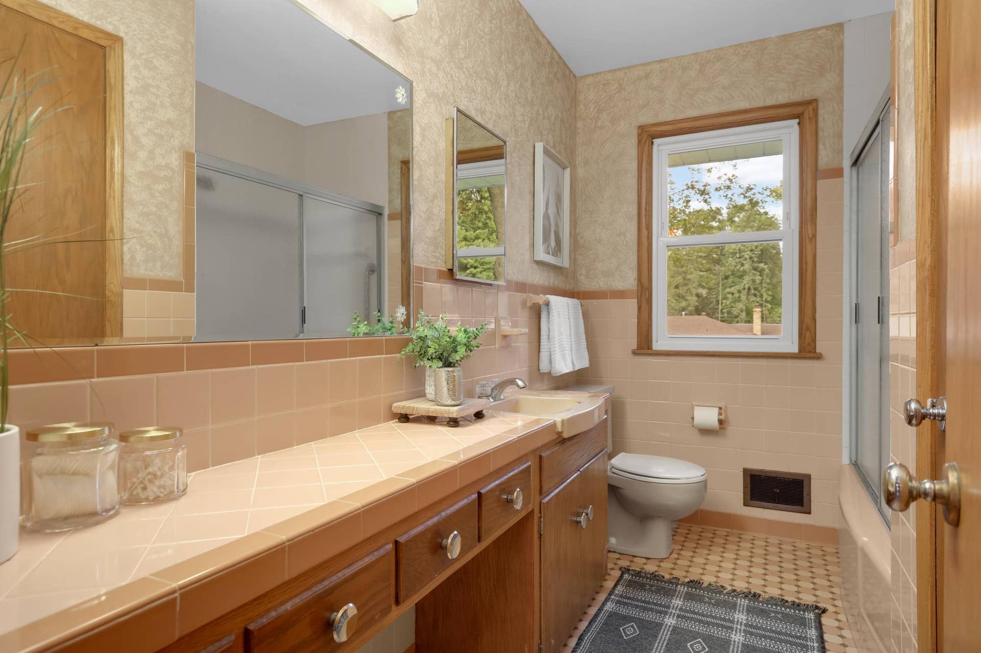 3829 Oak Street N, Brooklyn Center, MN 55429 Enjoy retro details in the bathroom and pristine original tiles.