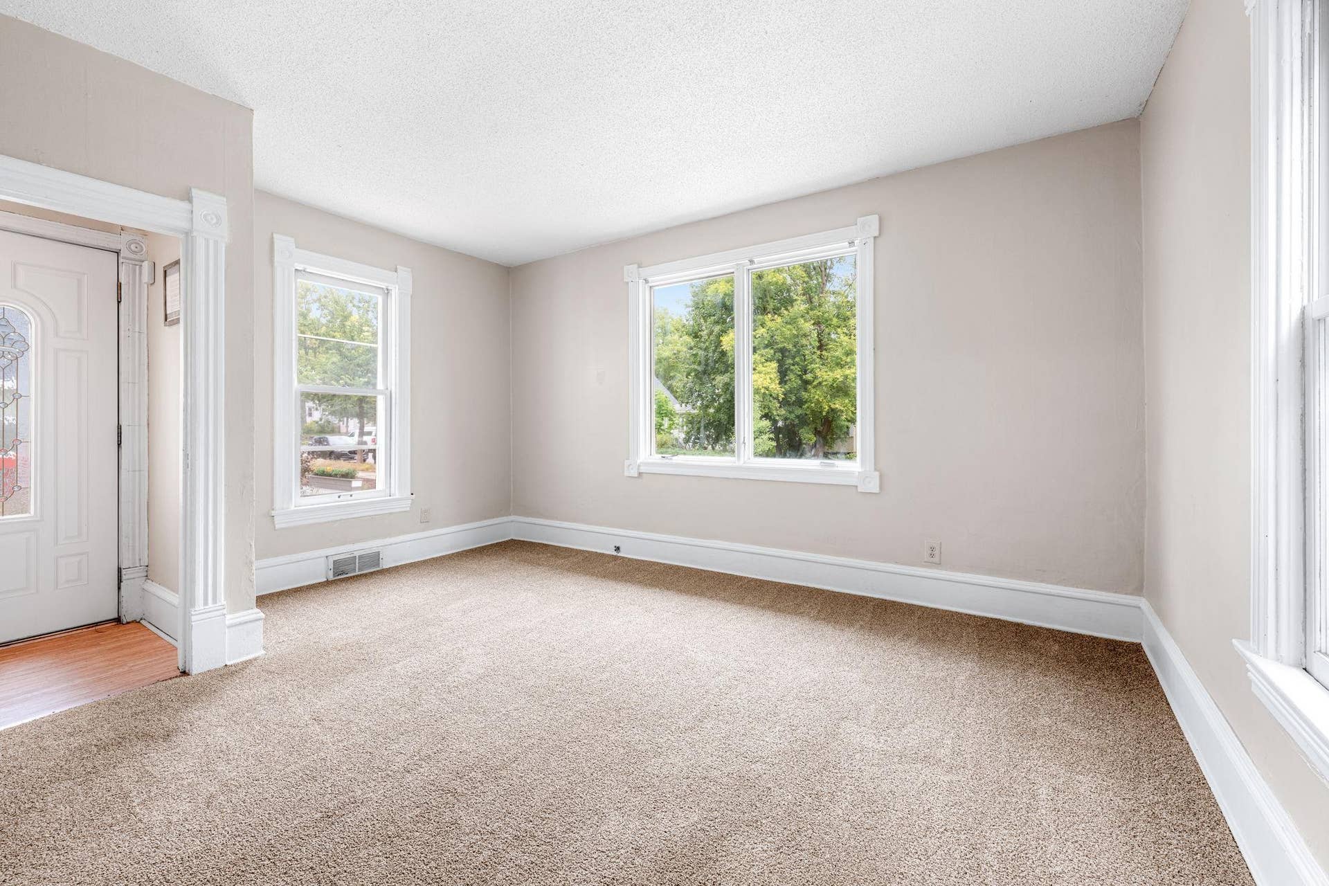 3010 Tyler Street NE, 2, Minneapolis, MN 55418 Large windows flood the room with natural light.