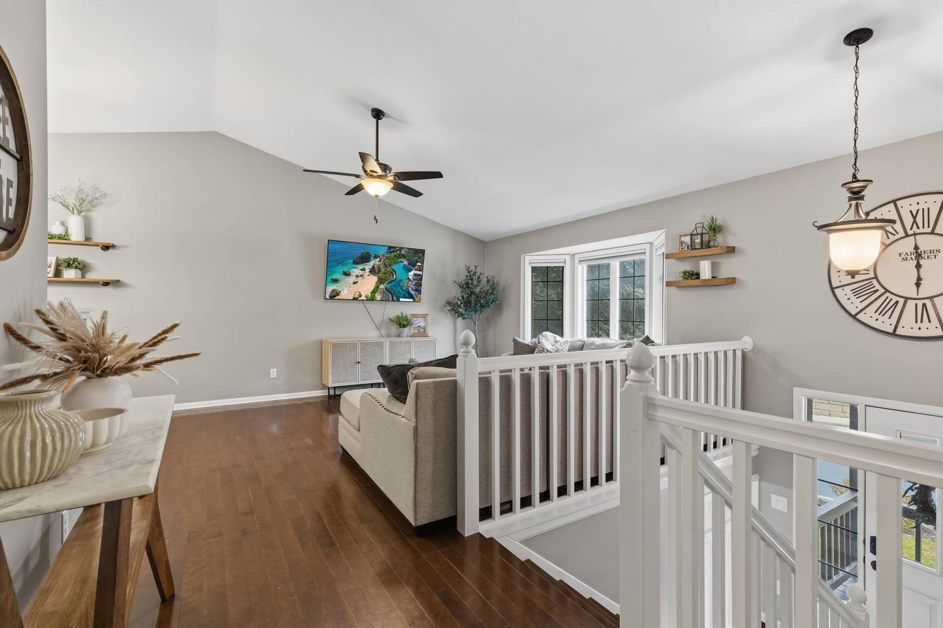15469 Fish Point Road SE, Prior Lake, MN 55372 Living Room features vaulted ceilings and maple hardwood floors
