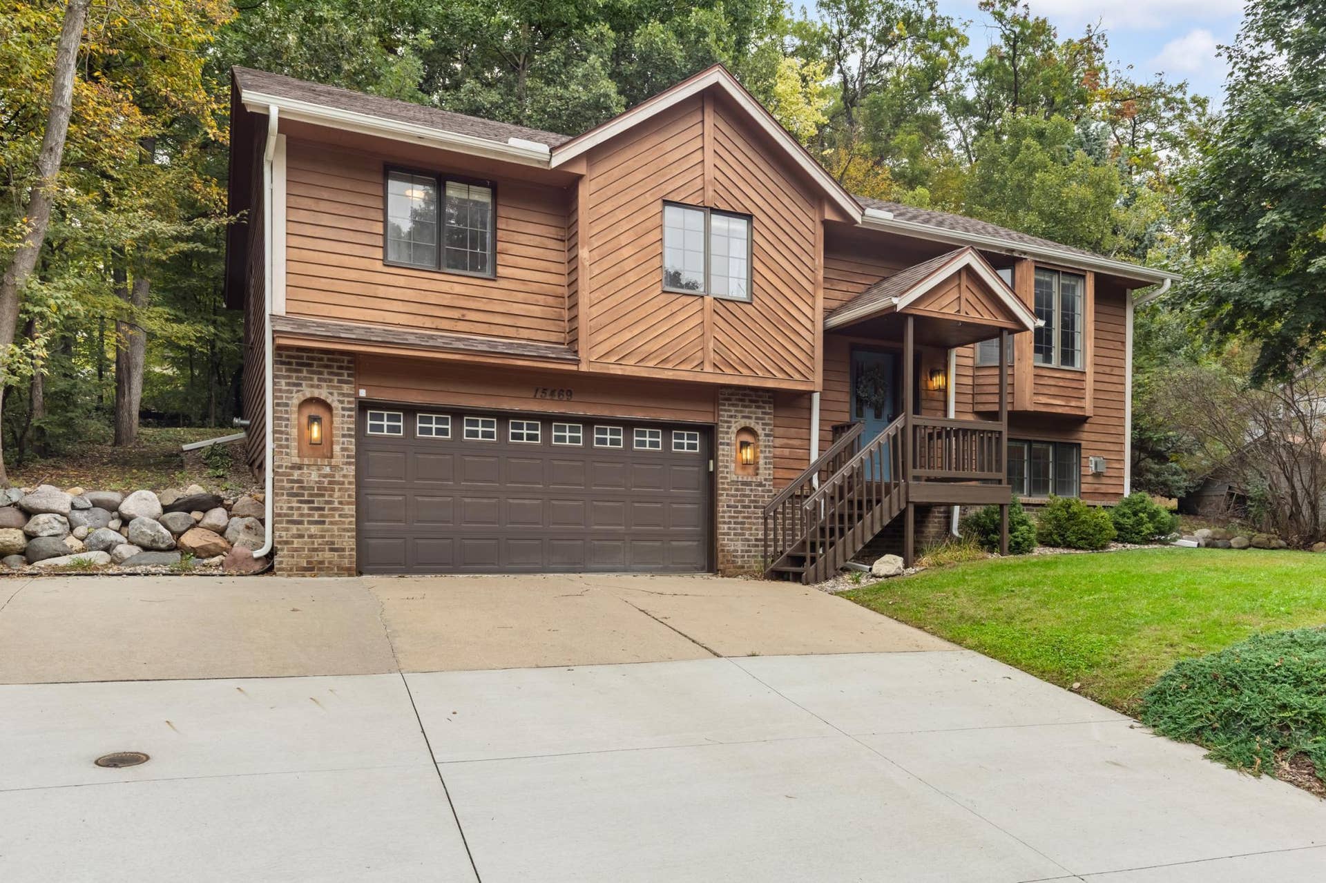 15469 Fish Point Road SE, Prior Lake, MN 55372 Tuck under 2 car garage with concrete driveway. Covered front entry