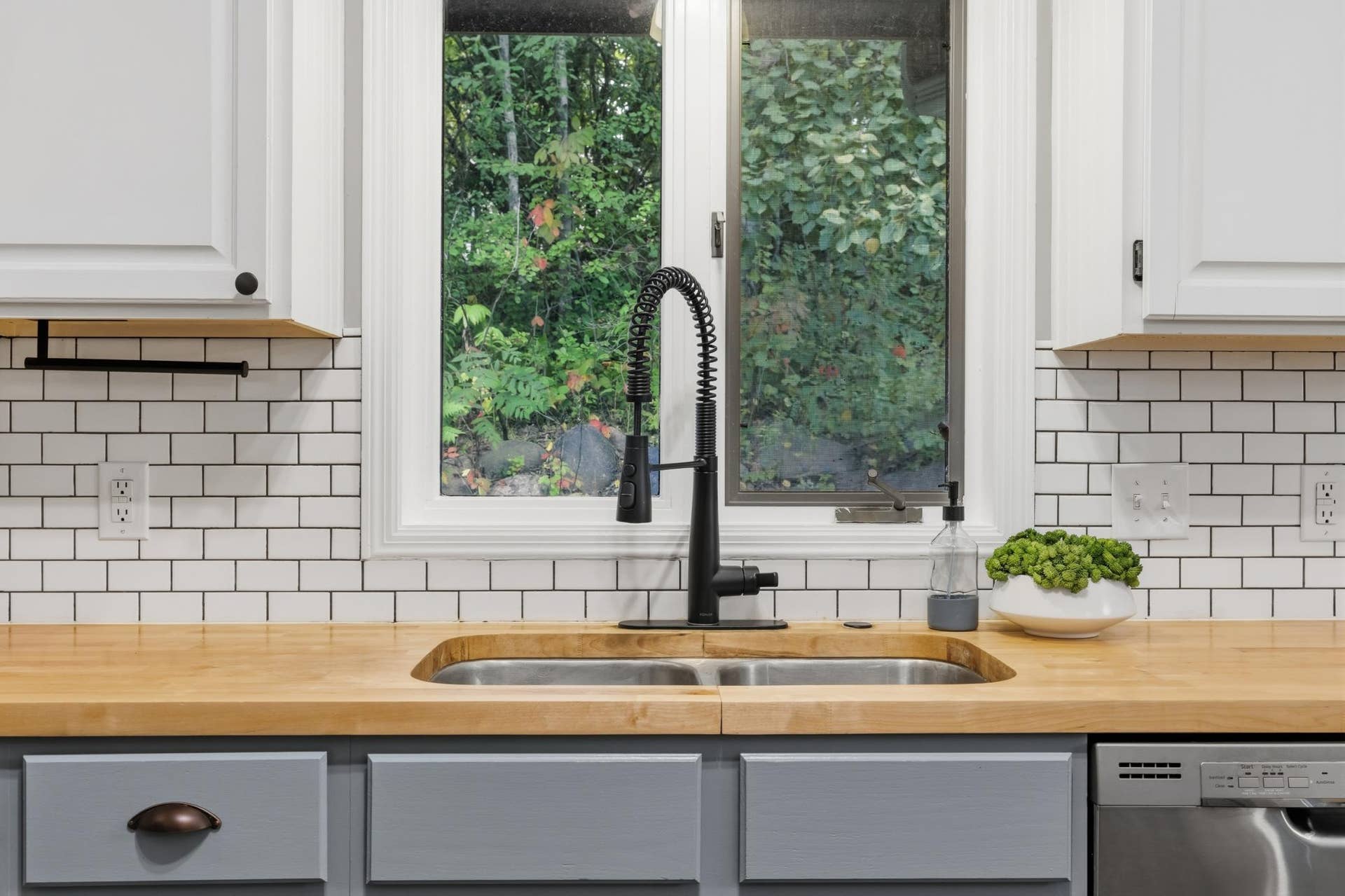 15469 Fish Point Road SE, Prior Lake, MN 55372 Butcher block countertops and classic subway tile backsplash