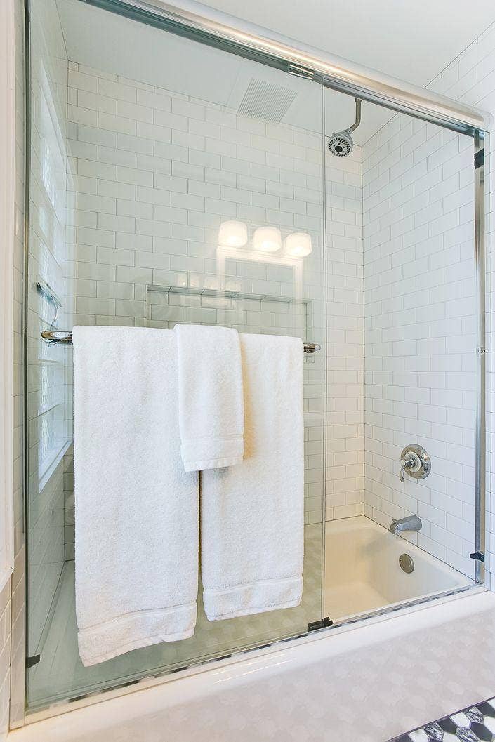 Newly designed bath with glass Shower Doors
