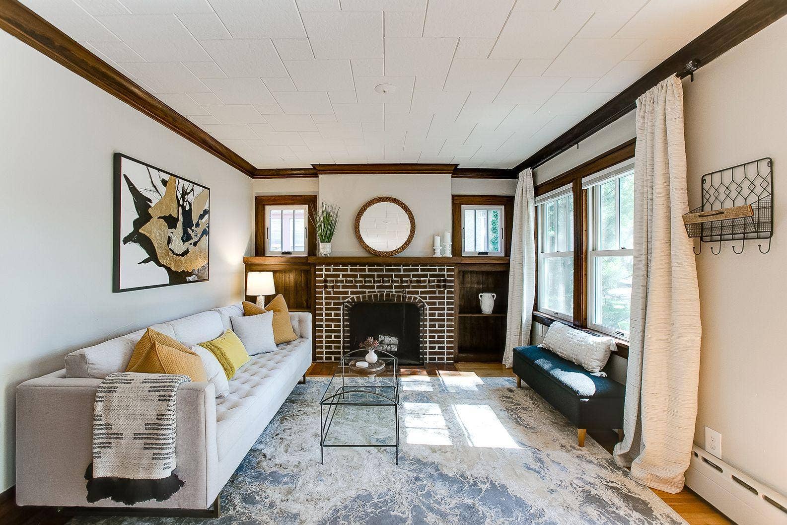 Living room with big windows  virtually staged