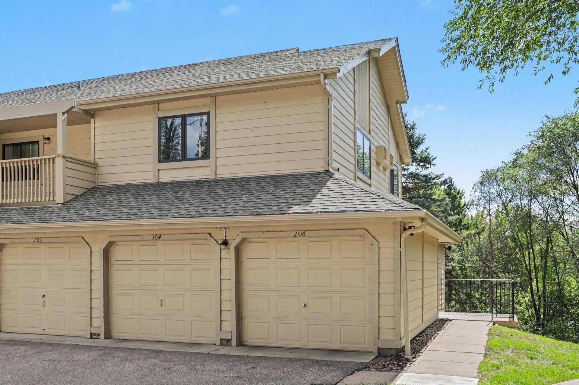 Private entrance and attached one car garage.