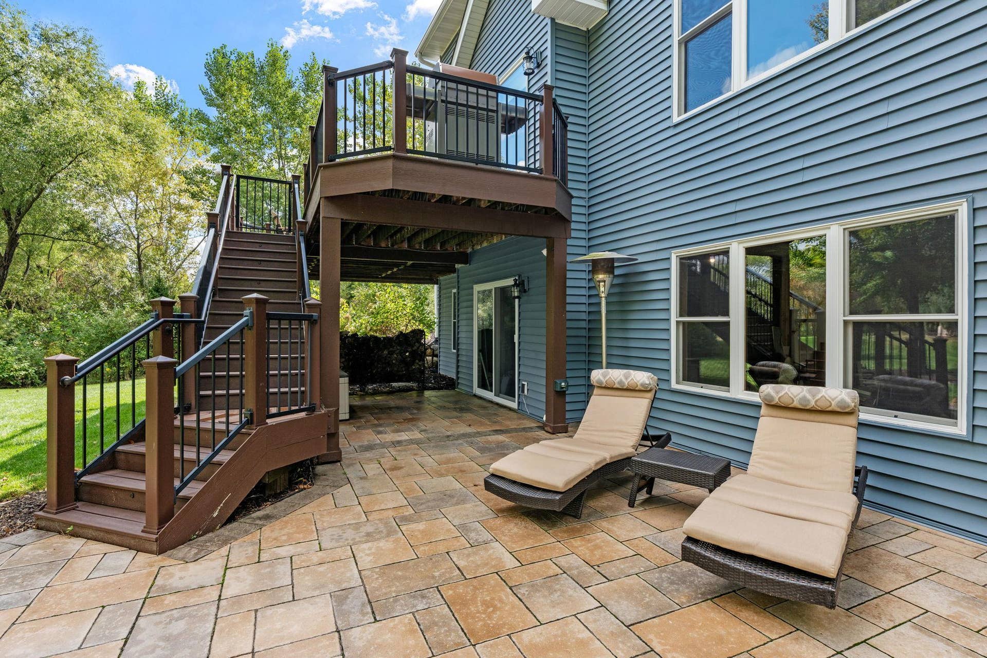 17550 73rd Avenue N, Maple Grove, MN 55311 Convenient access to the lower level with a walkout and stairs leading directly down from the deck.