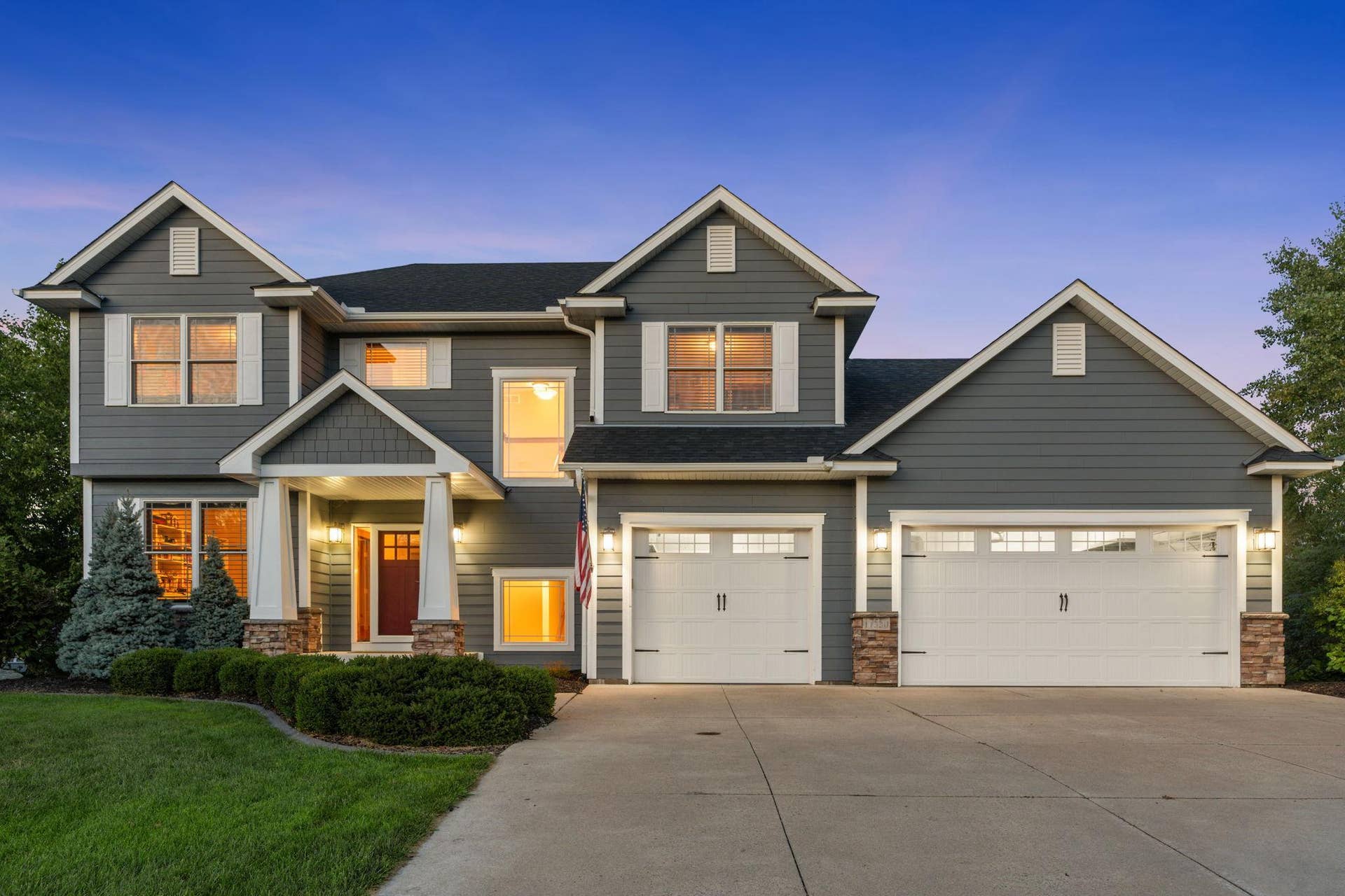 17550 73rd Avenue N, Maple Grove, MN 55311 A picture-perfect setting as the sun goes down and this beautiful home begins to glow.