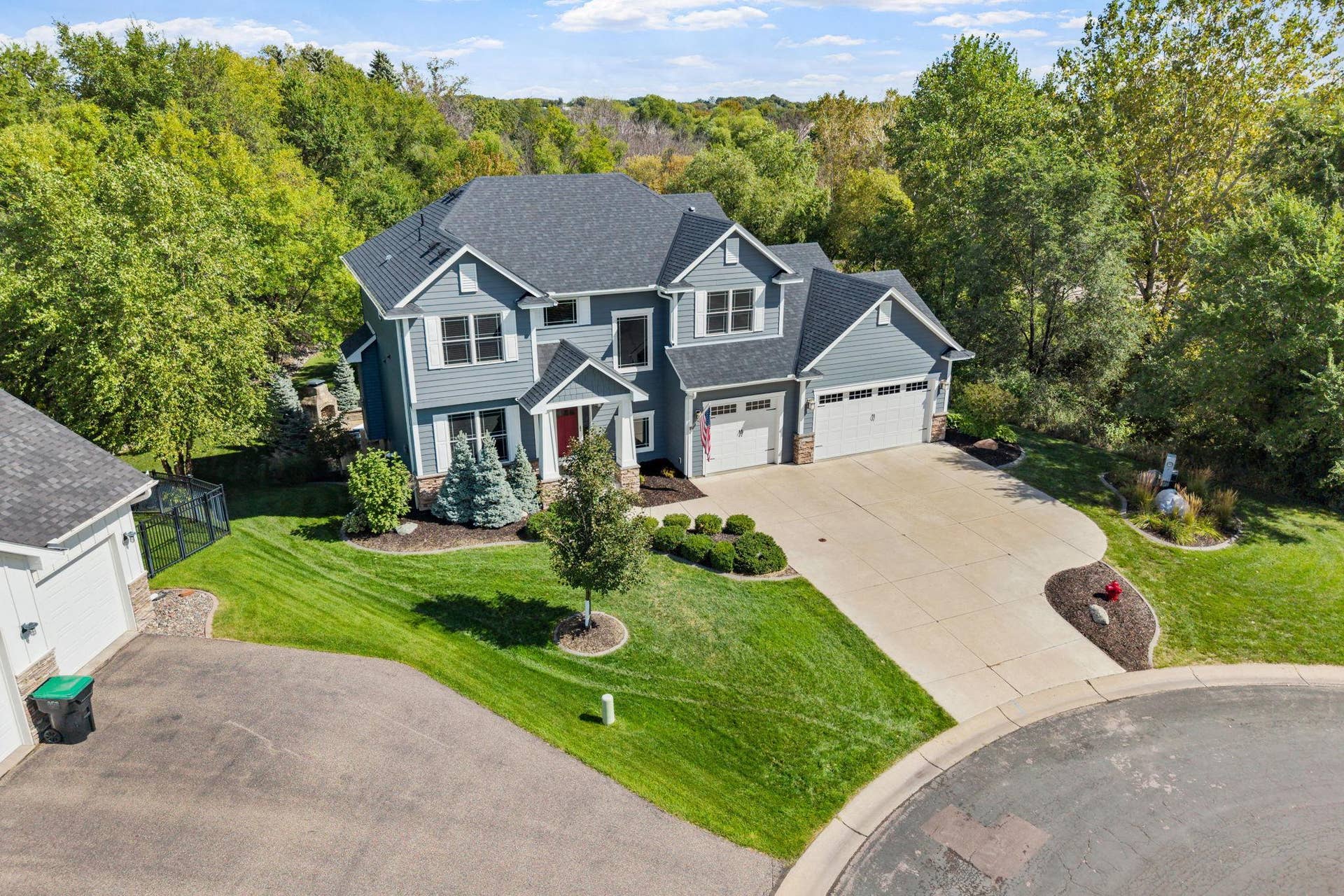 17550 73rd Avenue N, Maple Grove, MN 55311 A concrete driveway welcomes you home to this beautifully situated property tucked away on a quiet cul-de-sac.