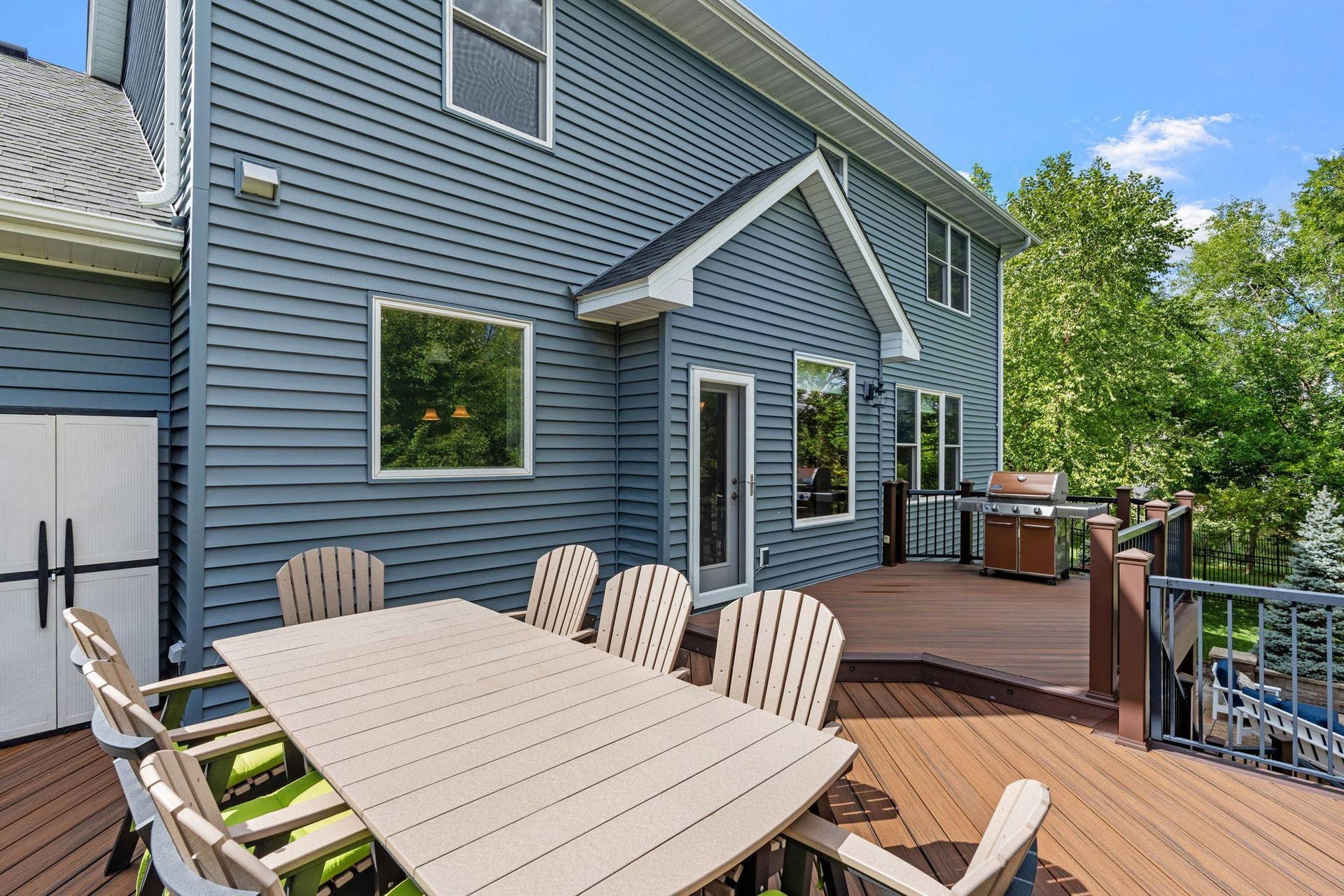 17550 73rd Avenue N, Maple Grove, MN 55311 A beautiful two-tier Trex deck adds valuable outdoor living space to the home.
