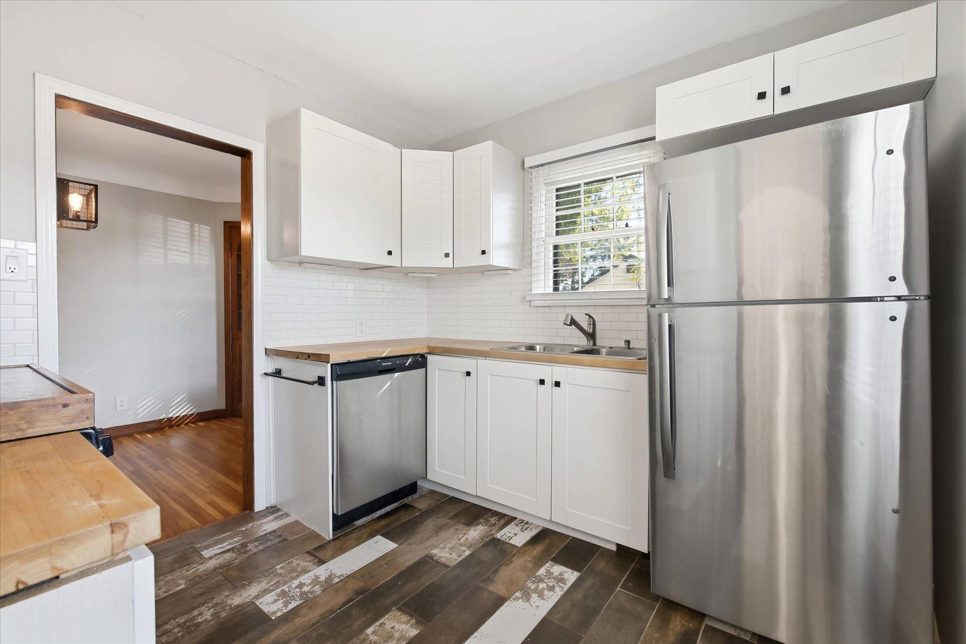 1118 Livingston Avenue, West Saint Paul, MN 55118 Updated kitchen with newer soft close cabinetry, butcher block countertop and stainless steel appliances.