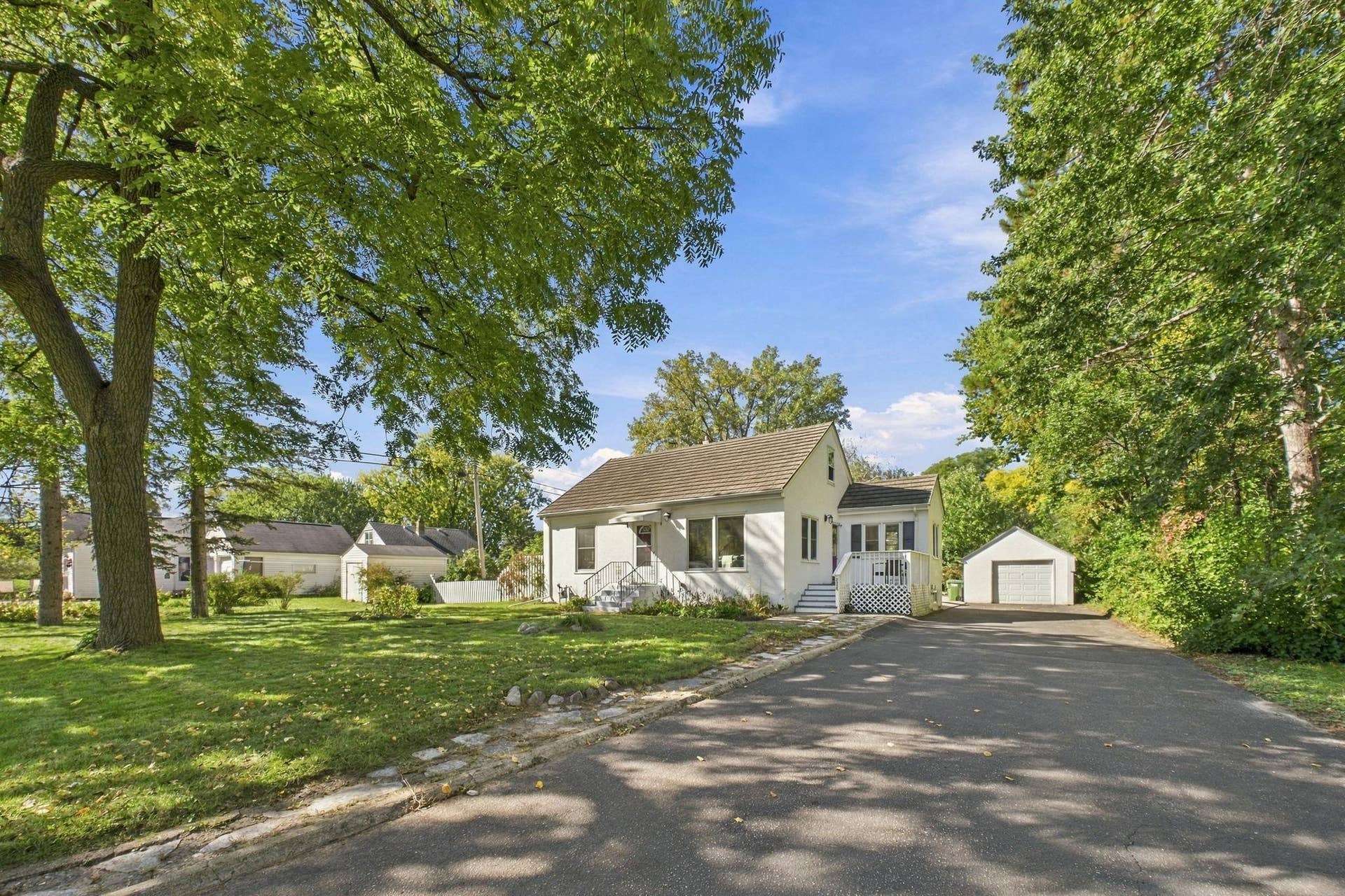 2359 Victoria Street N, Roseville, MN 55113 Daylight Front Exterior with Lush Landscaping & Detached Garage
