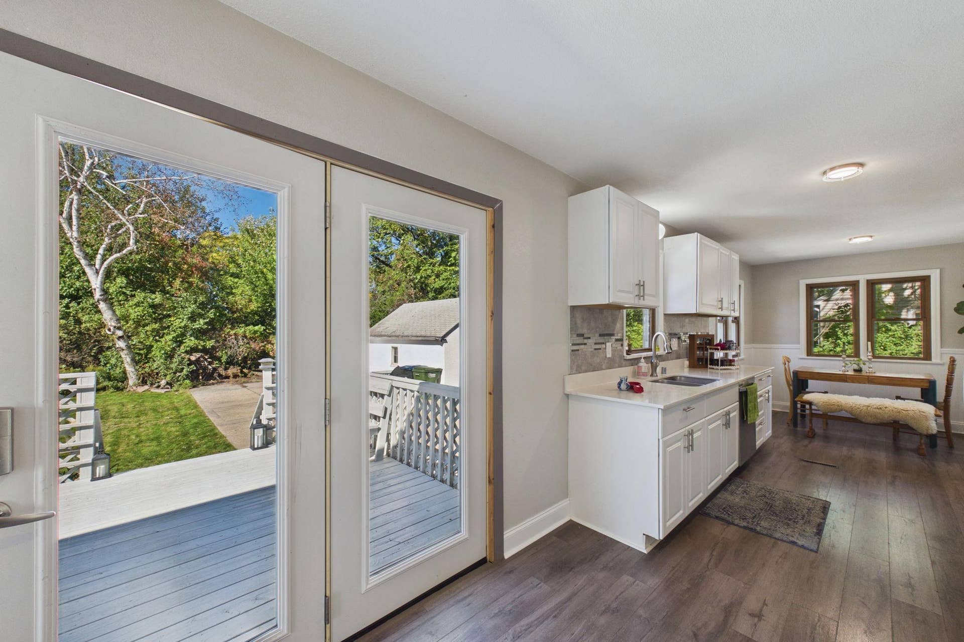 2359 Victoria Street N, Roseville, MN 55113 Seamless Kitchen-to-Backyard Flow with Expansive Deck Views