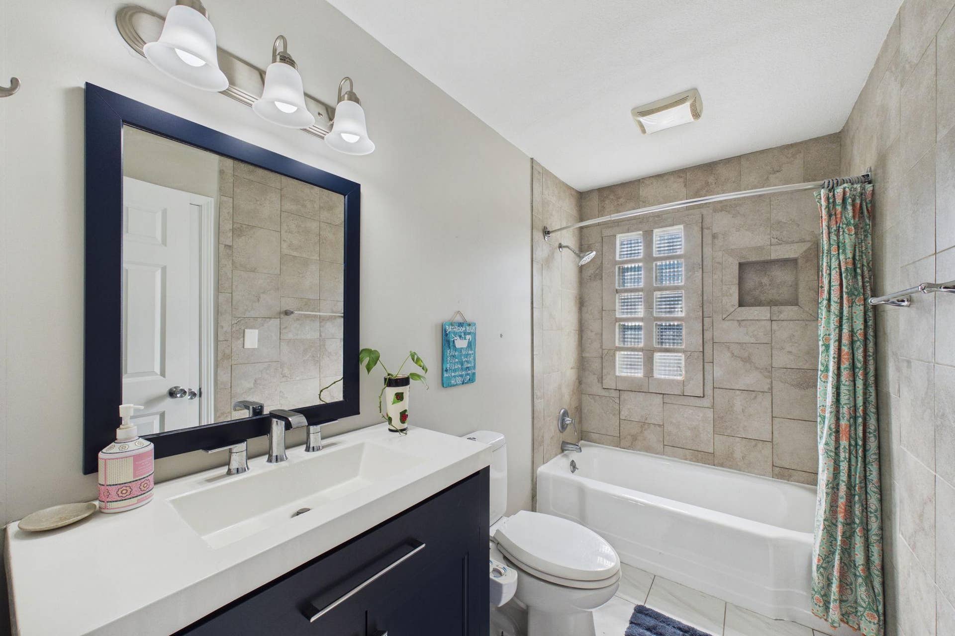 2359 Victoria Street N, Roseville, MN 55113 Updated Bath with Tile Surround & Natural Light-Enhancing Glass