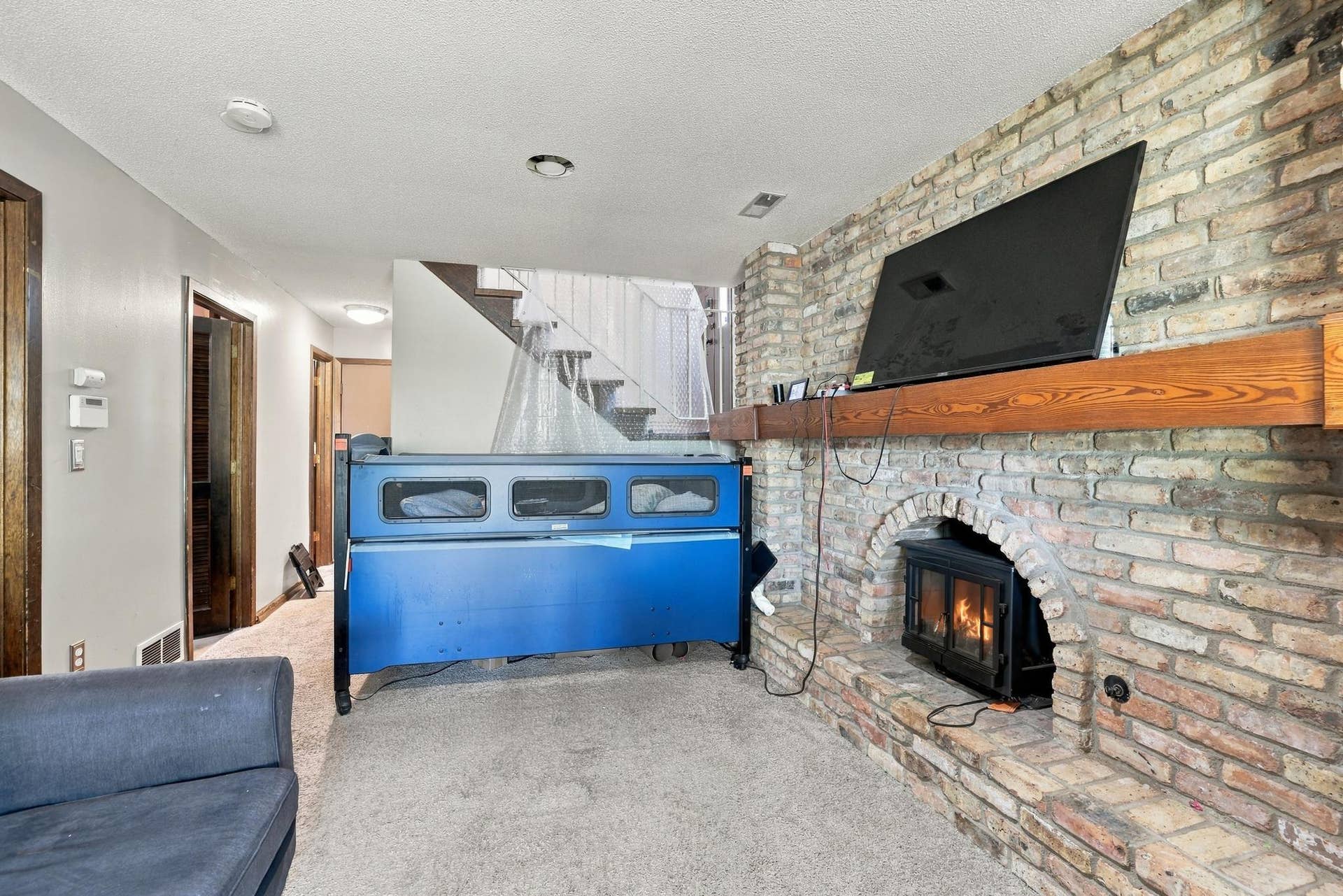 7865 Yucca Lane N, #A, Maple Grove, MN 55311 Family Room in Lower Level.jpg