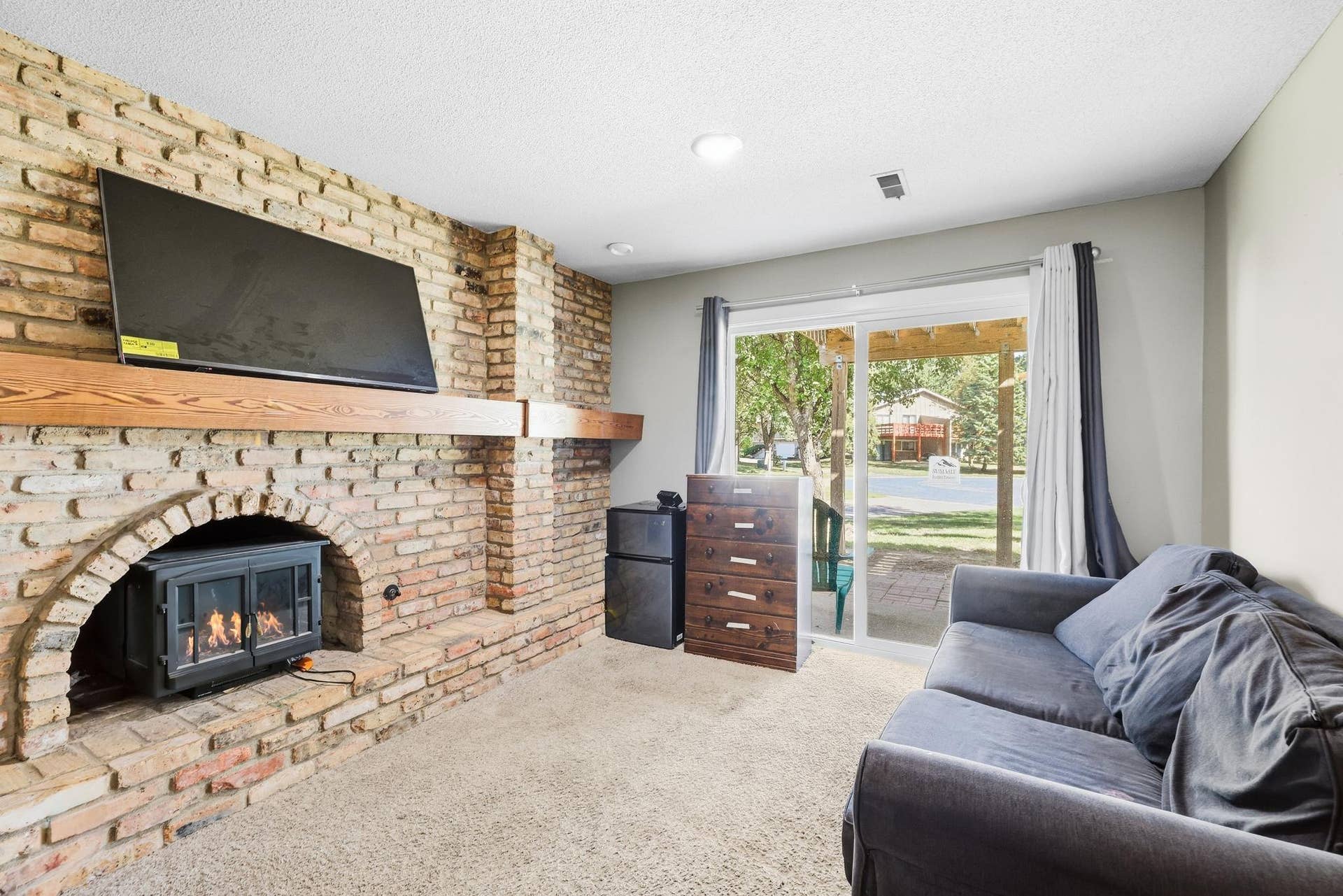 7865 Yucca Lane N, #A, Maple Grove, MN 55311 Family Room Walkout in Lower Level.jpg