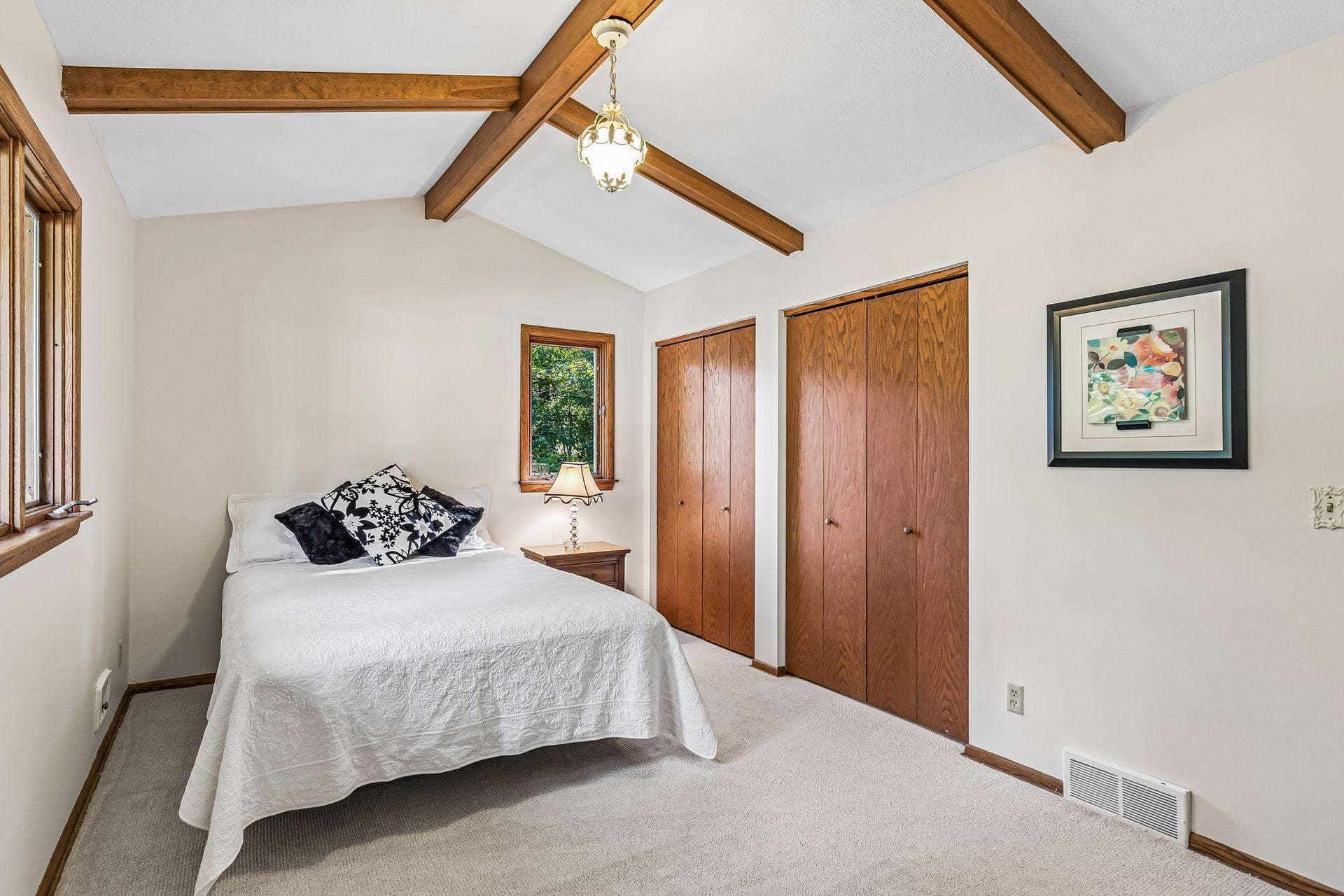 2931 Cedar Knoll Court, Minnetonka, MN 55305 Primary Bedroom with vaulted ceiling, beautiful beams and double closet.