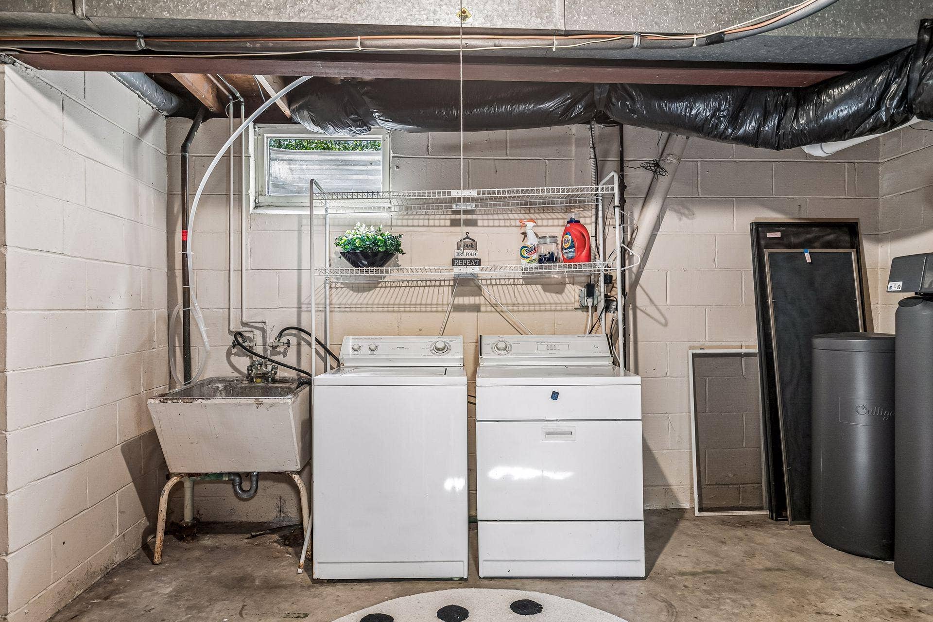 2931 Cedar Knoll Court, Minnetonka, MN 55305 Laundry area is very roomy with plenty of storage space.