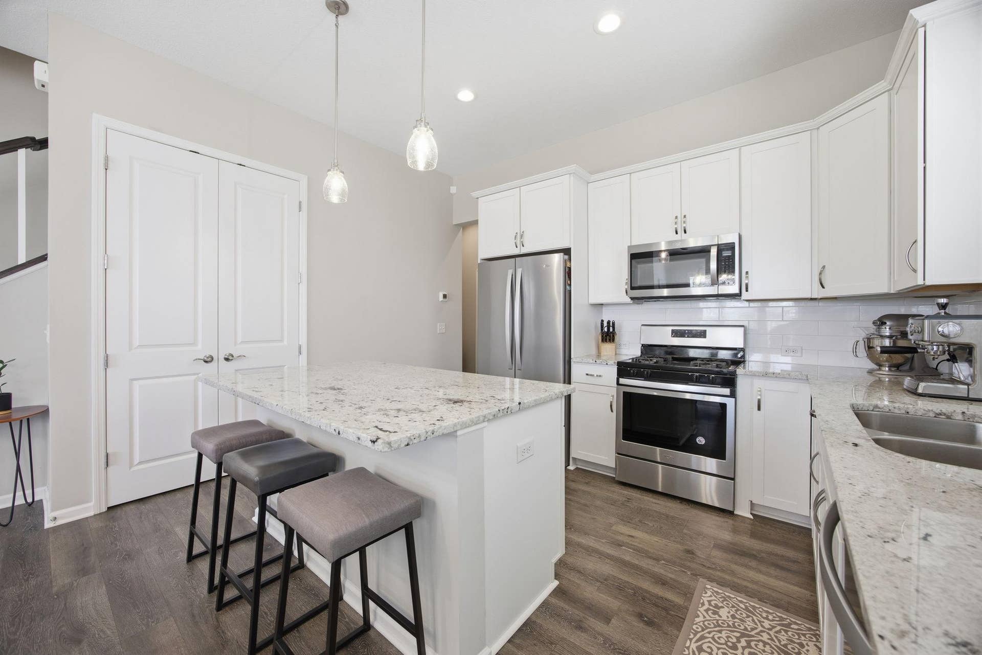 8164 Arrowwood Lane N, Maple Grove, MN 55369 Spacious Maple Grove kitchen with granite countertops, generous counter space, and a functional island layout