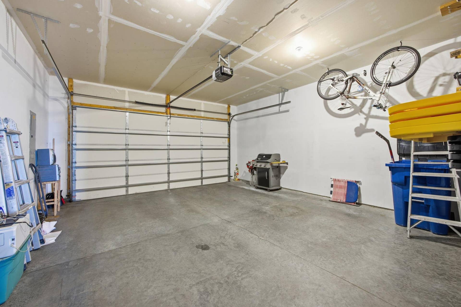 8164 Arrowwood Lane N, Maple Grove, MN 55369 Attached 2-car garage with built-in storage, offering practical space for vehicles, tools, and everyday organization