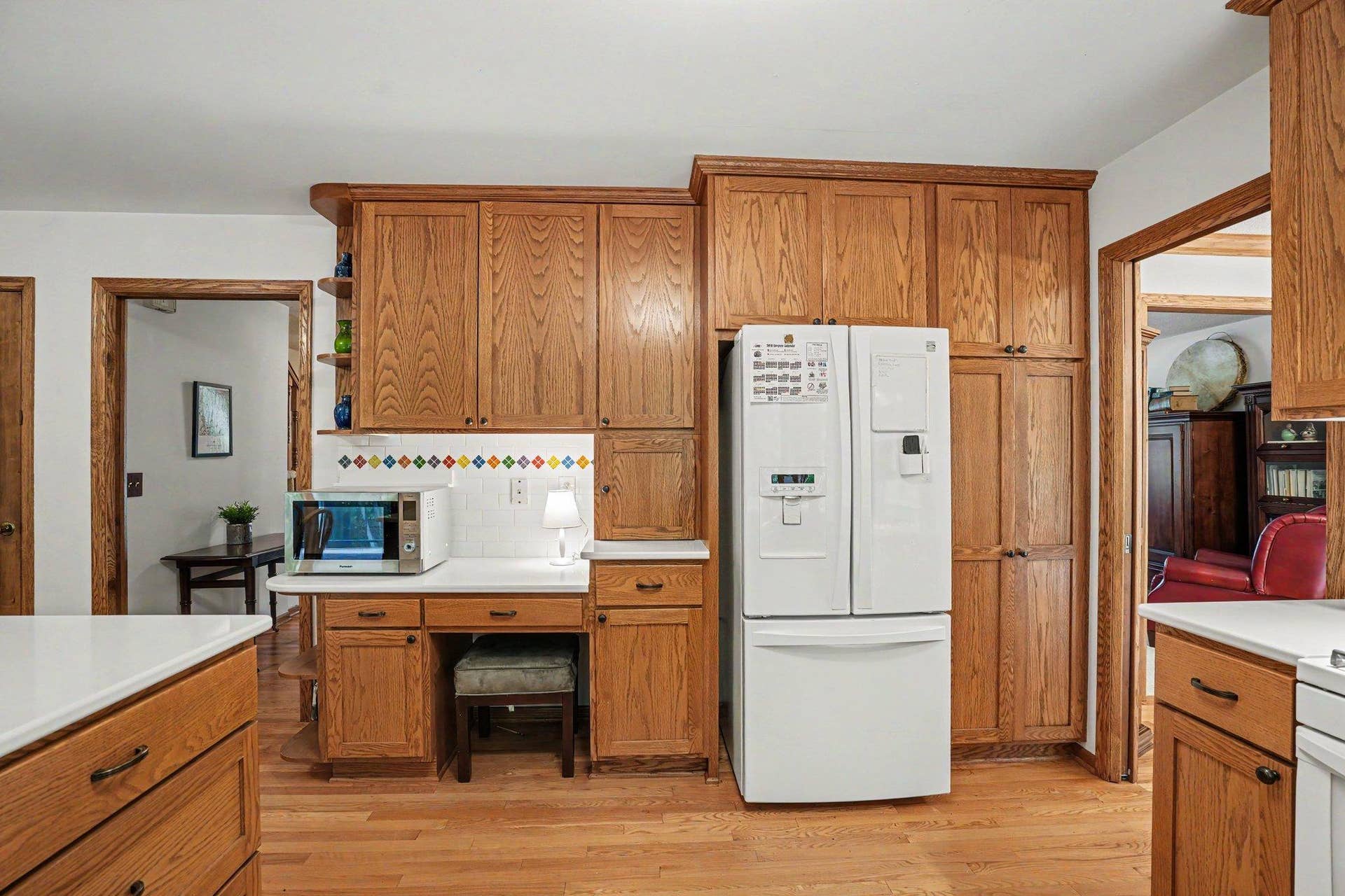 Desk area and kitchen storage