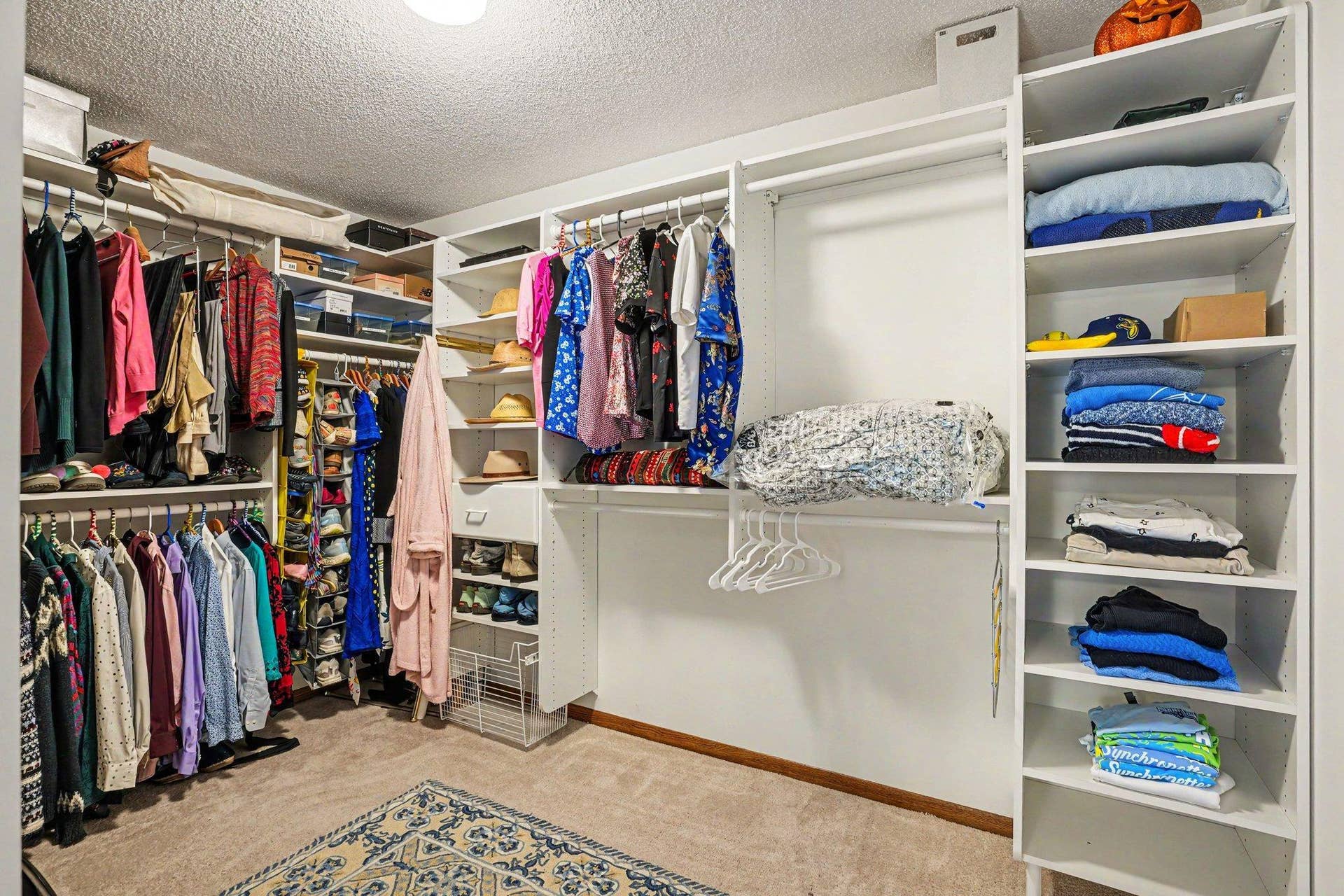 There is shelving on all sides of the closet