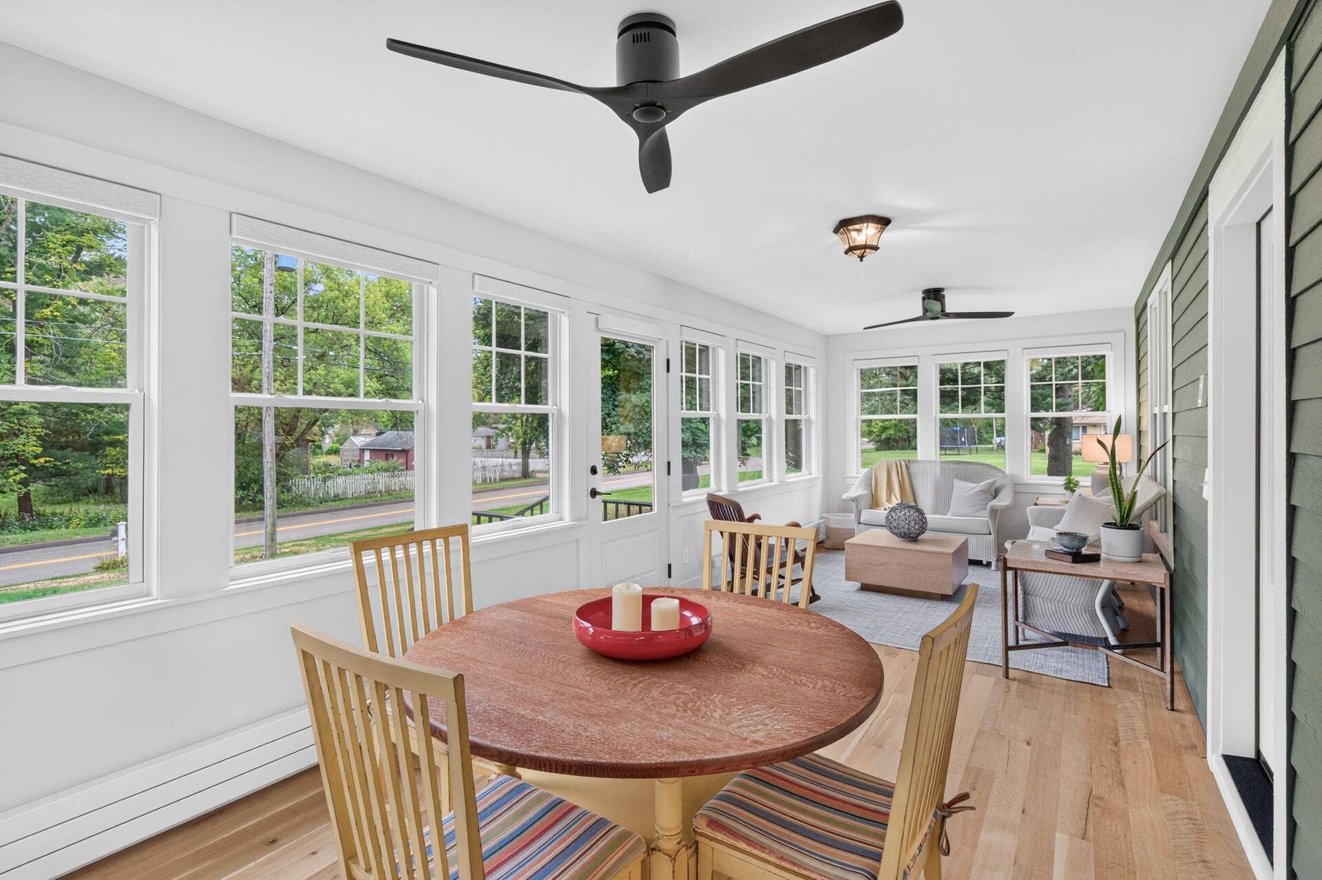 1835 Stillwater Street, White Bear Lake, MN 55110 The newly added four-season front porch is flooded with natural light, creating an inviting space to enjoy year-round.