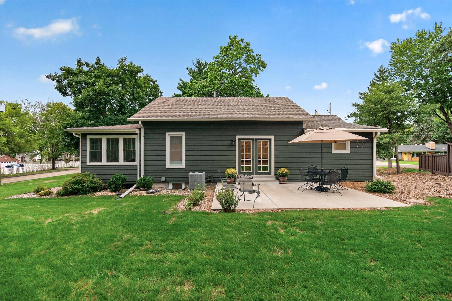 1835 Stillwater Street, White Bear Lake, MN 55110 The spacious 18x14 concrete patio sets the scene for sunny afternoons, a favorite beverage, and time spent outdoors.