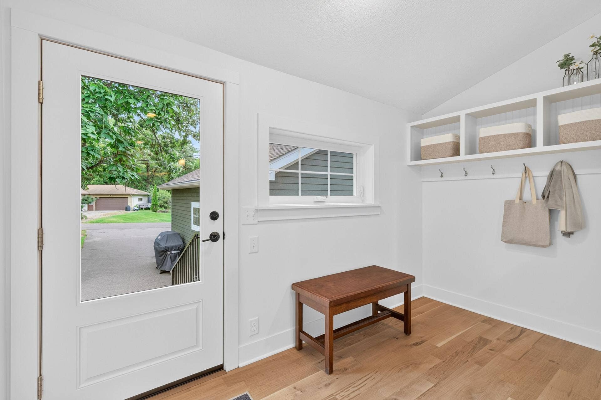 1835 Stillwater Street, White Bear Lake, MN 55110 Just off the kitchen, a convenient side entry creates the perfect drop zone for everyday arrivals, gear, and life on the go.