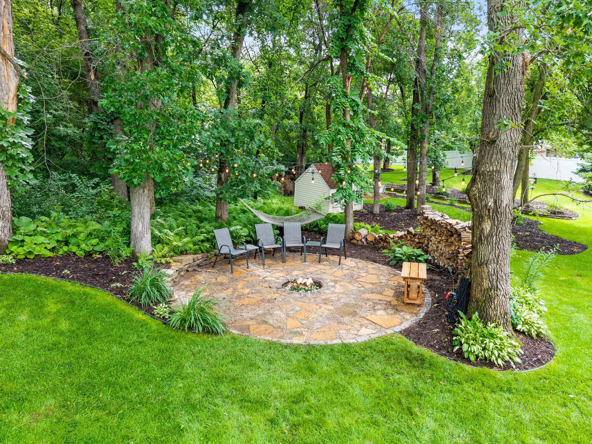 19497 Boston Street NW, Elk River, MN 55330 The firepit area.