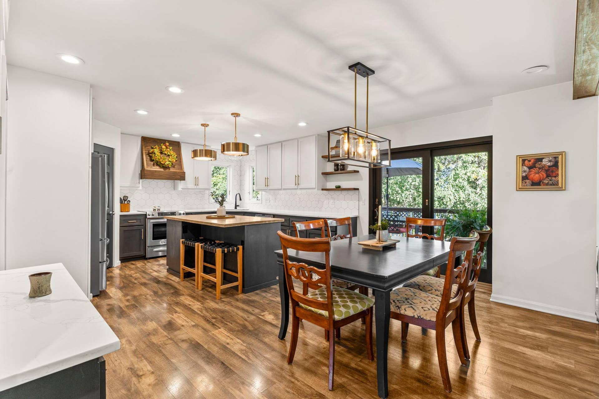 19497 Boston Street NW, Elk River, MN 55330 The kitchen and dining room provide access to the deck and backyard.