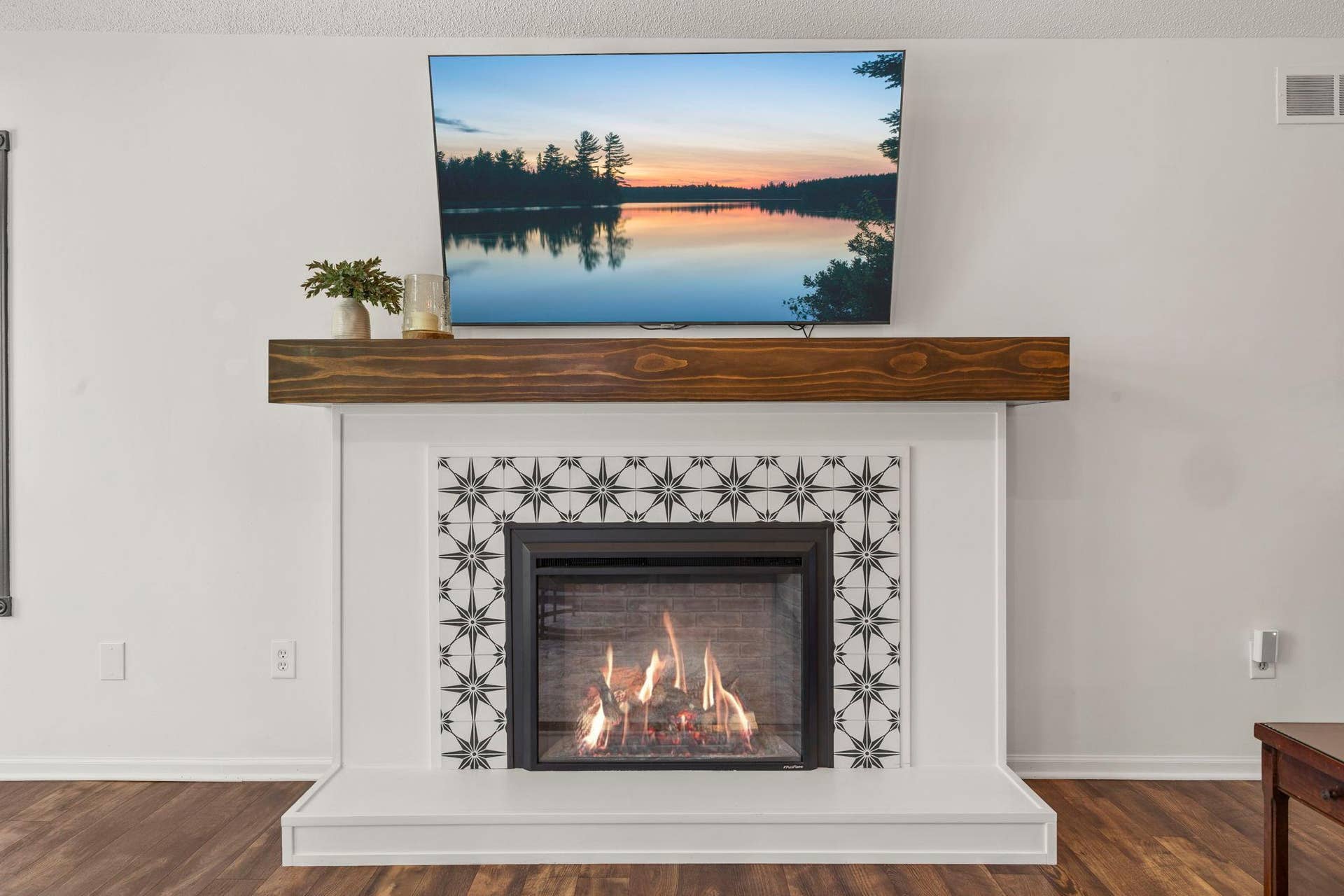 19497 Boston Street NW, Elk River, MN 55330 The fireplace in the main level living room was tiled and offers a modern look to the room.