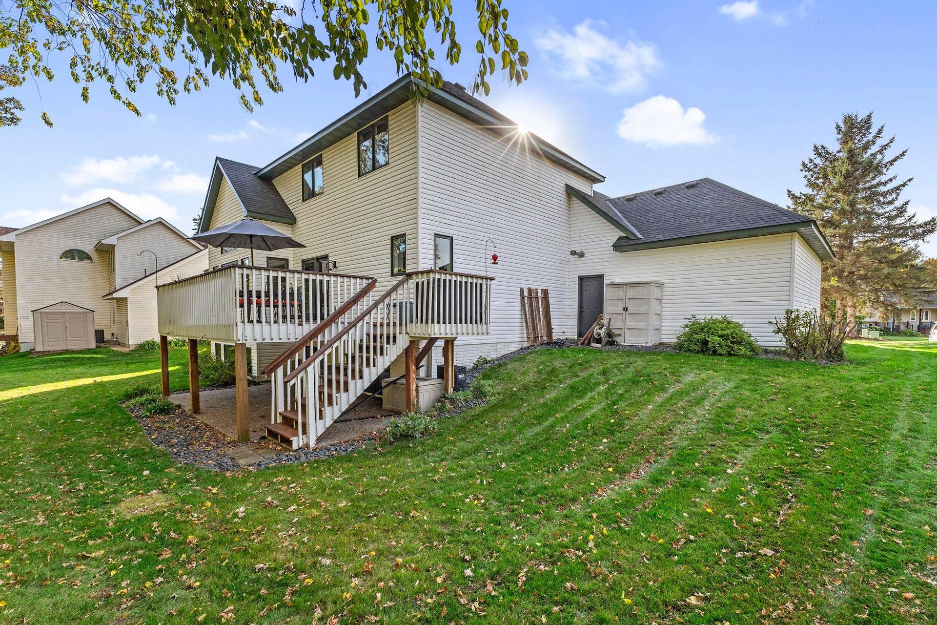 19497 Boston Street NW, Elk River, MN 55330 The backyard is accessible from the deck.