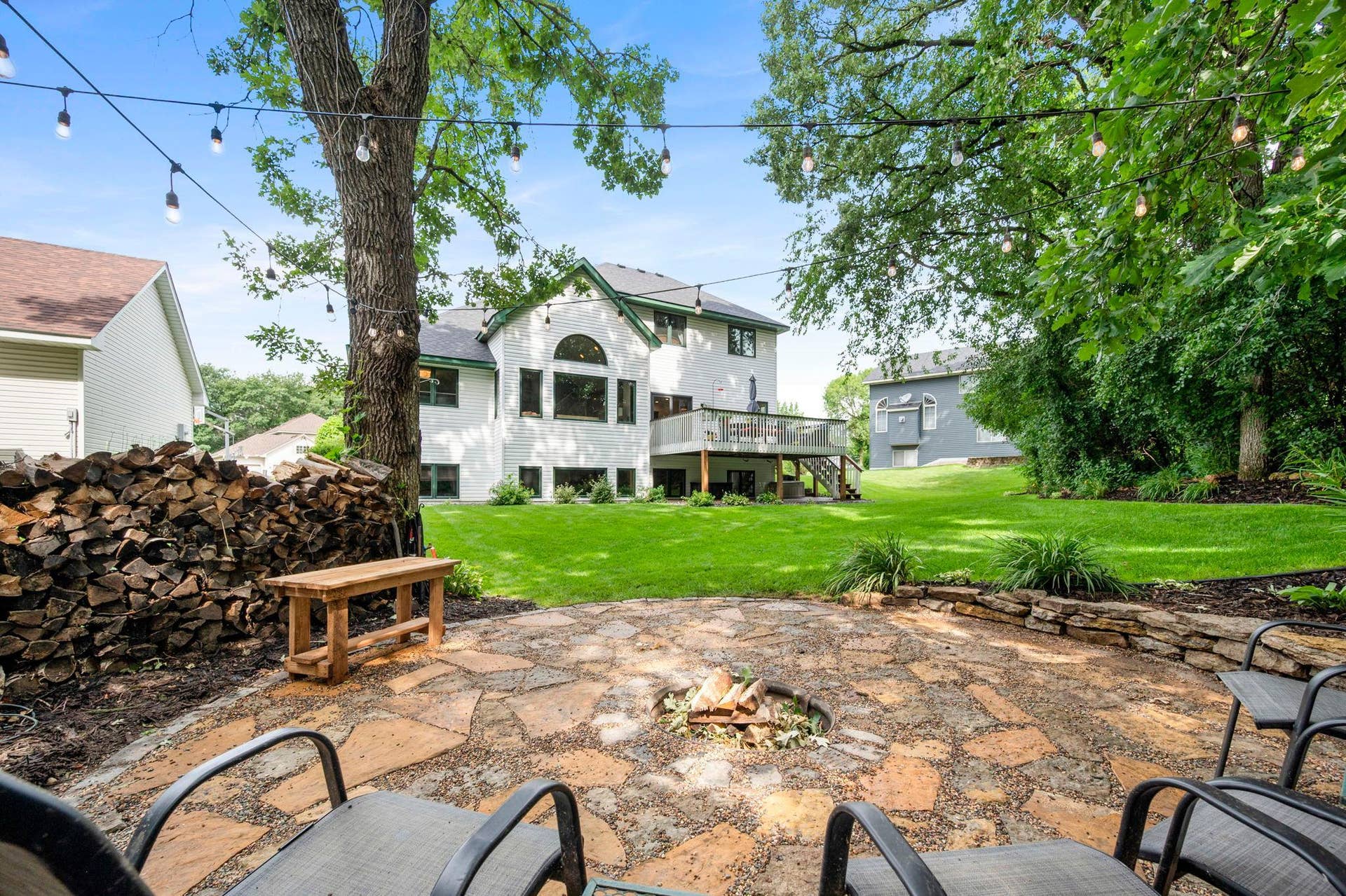 19497 Boston Street NW, Elk River, MN 55330 A cozy firepit area is ready for fall evenings in the backyard.