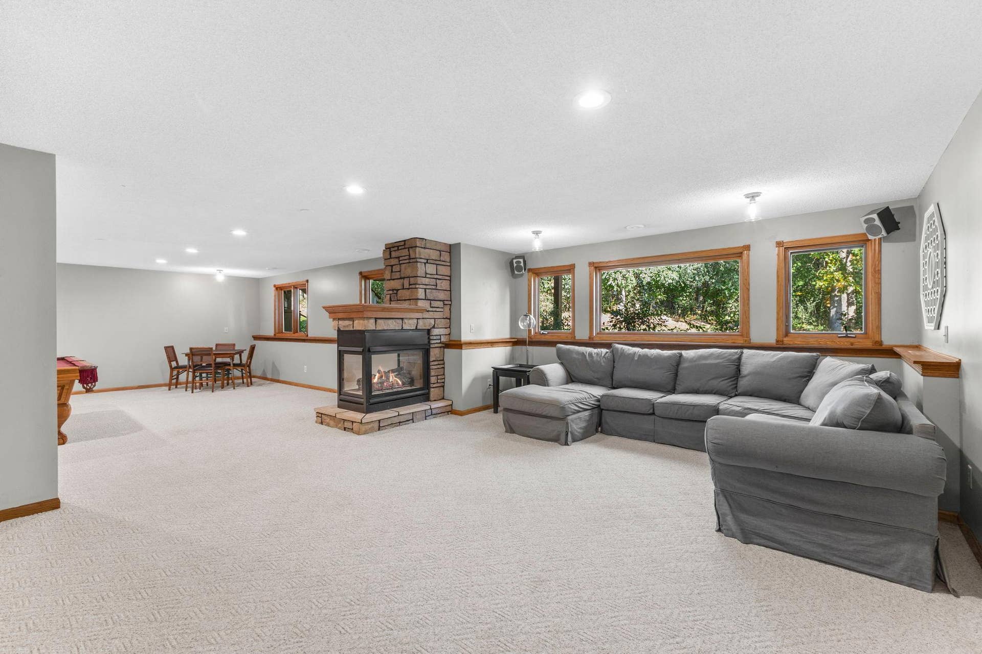 19497 Boston Street NW, Elk River, MN 55330 The oversized recreation room in the basement offers views of the backyard.