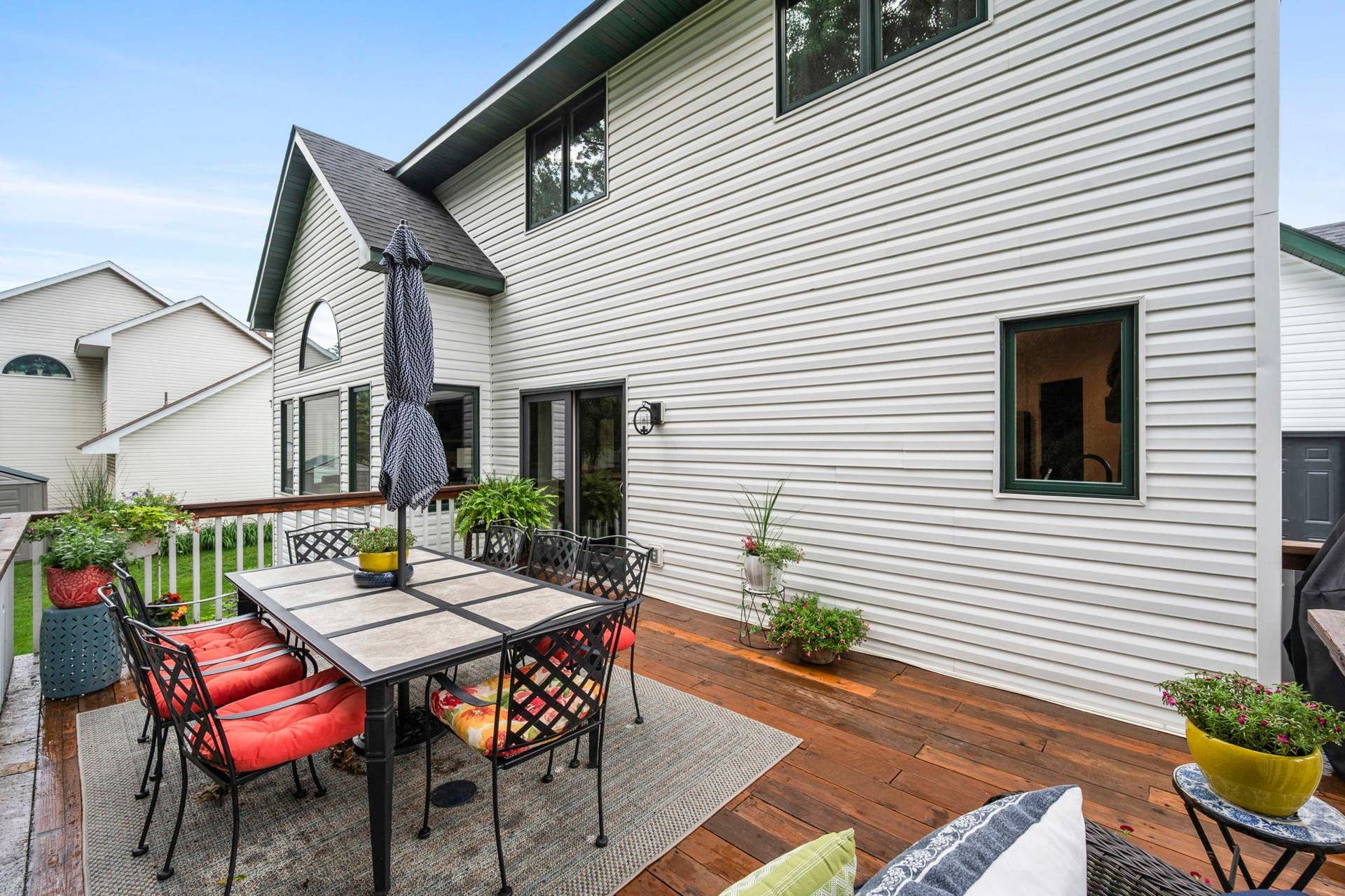 19497 Boston Street NW, Elk River, MN 55330 The deck is oversized with room for entertaining.