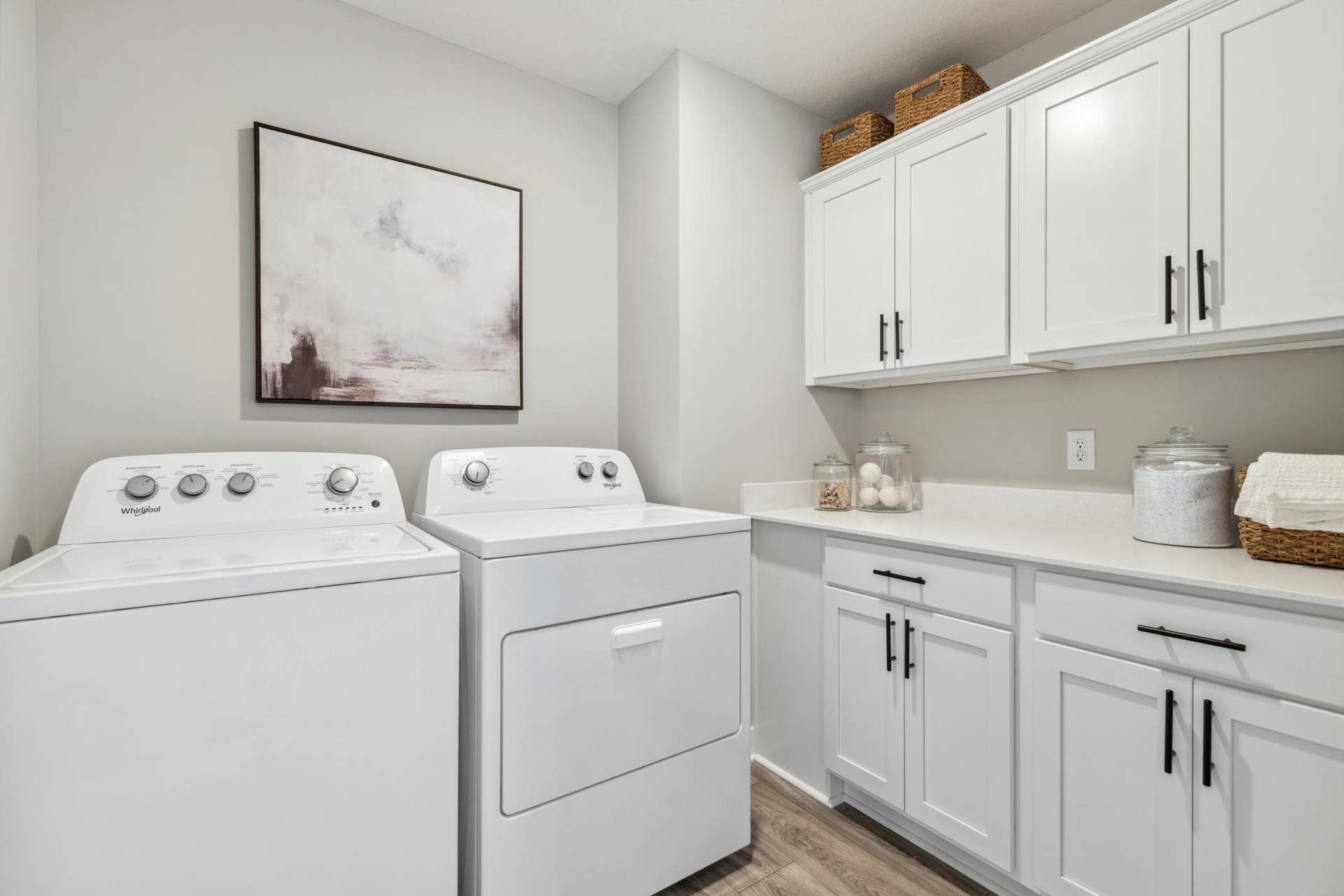 4901 Blake Way, Woodbury, MN 55129 Large laundry room with cabinets.