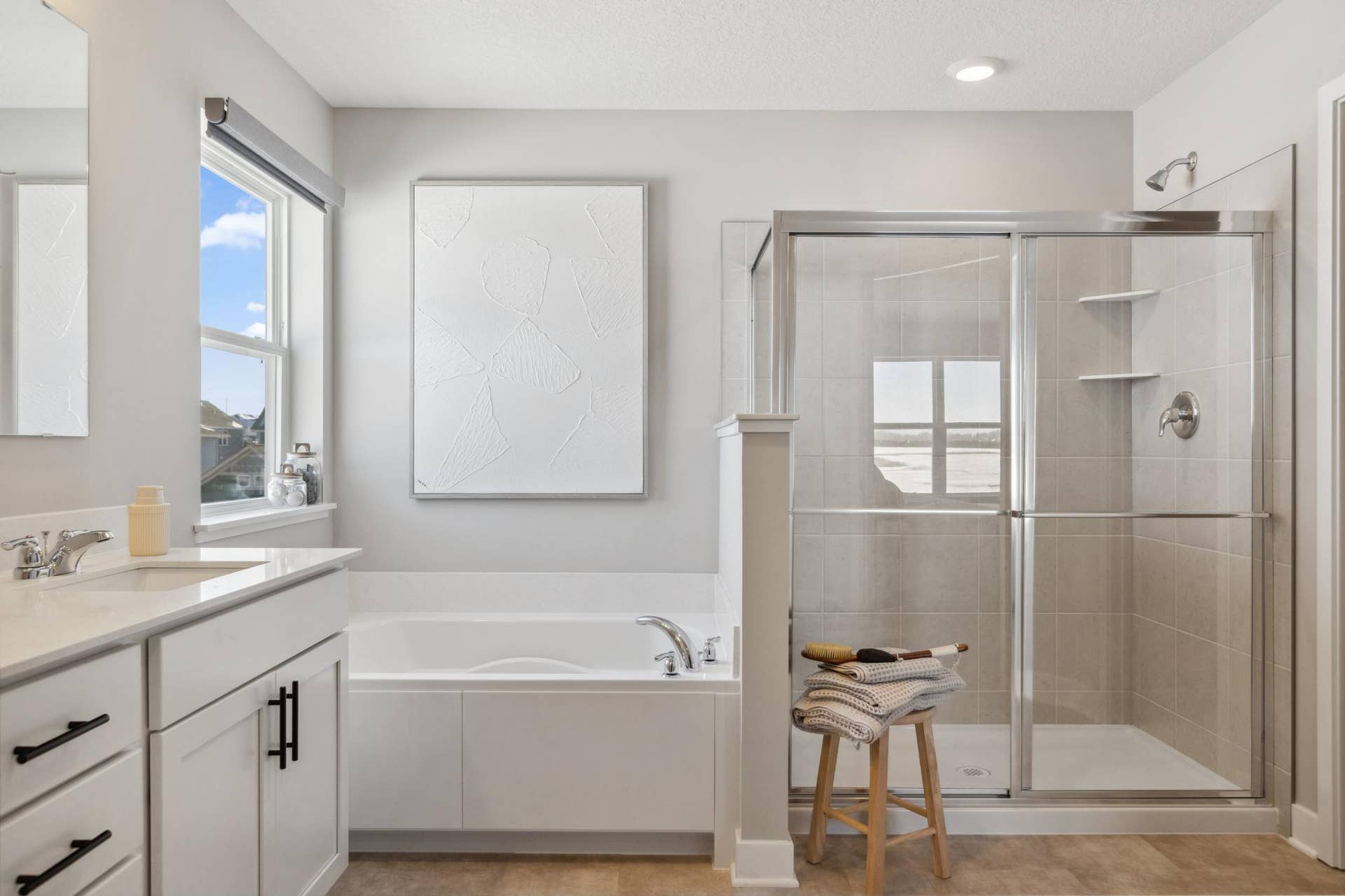 4901 Blake Way, Woodbury, MN 55129 Tile shower and soaking tub in primary bath.