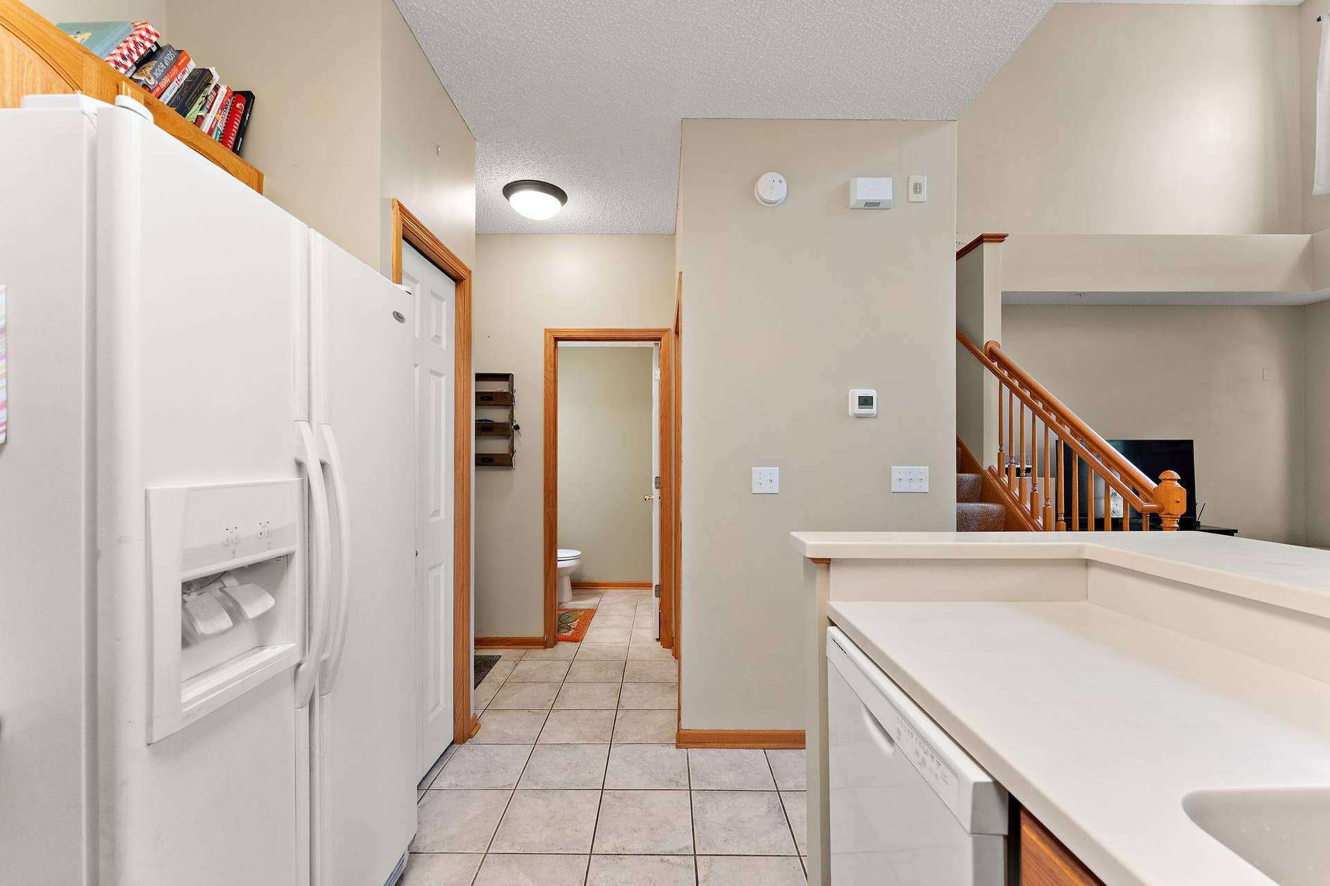 1610 Woodlynn Avenue, #3, Maplewood, MN 55109 View to main floor 1/2 bath!