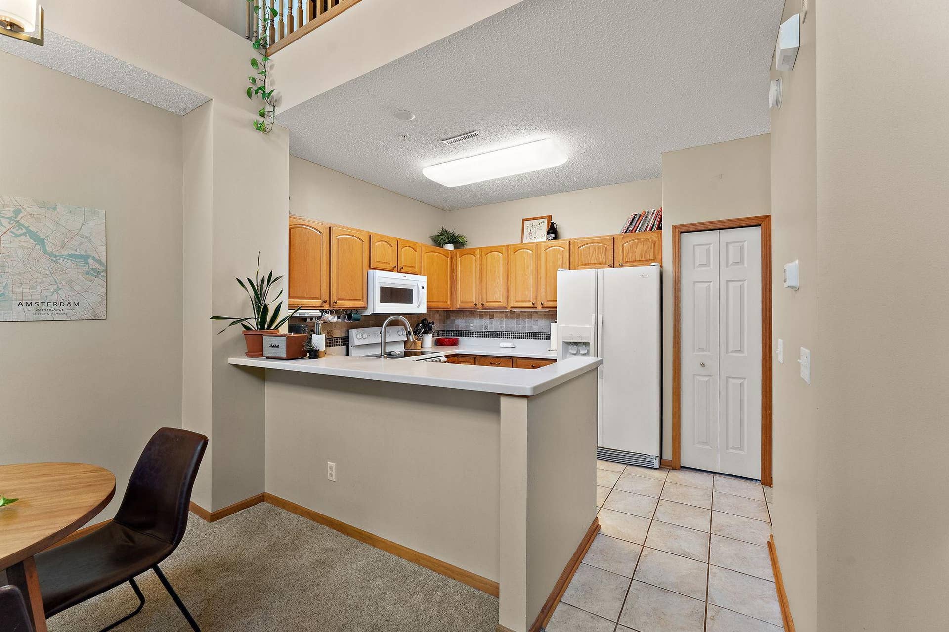 1610 Woodlynn Avenue, #3, Maplewood, MN 55109 Easy to use kitchen! Staged
