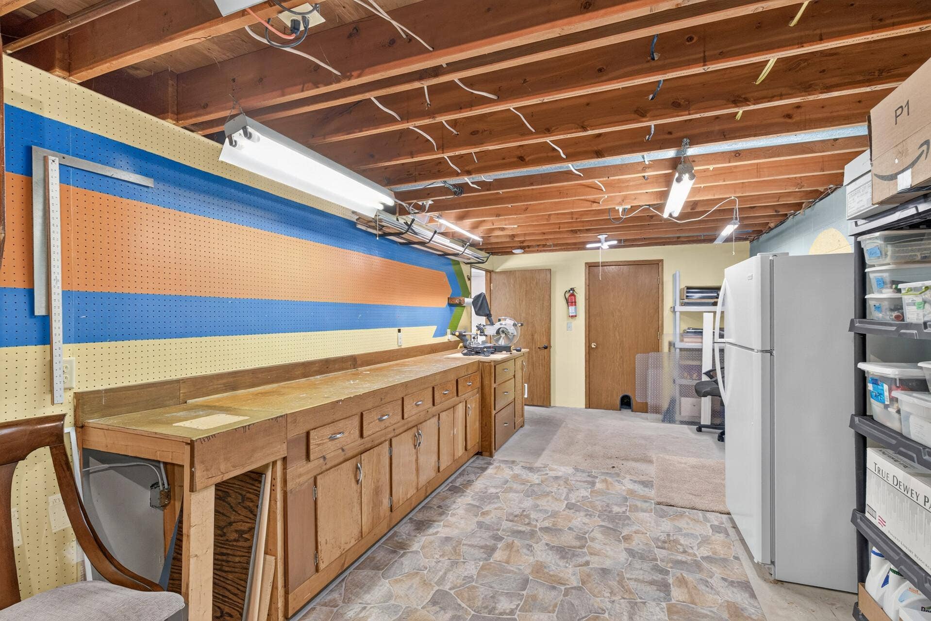 4315 Kaufmanis Way, Eagan, MN 55123 Workshop allows for extra storage, plus additional storage room
