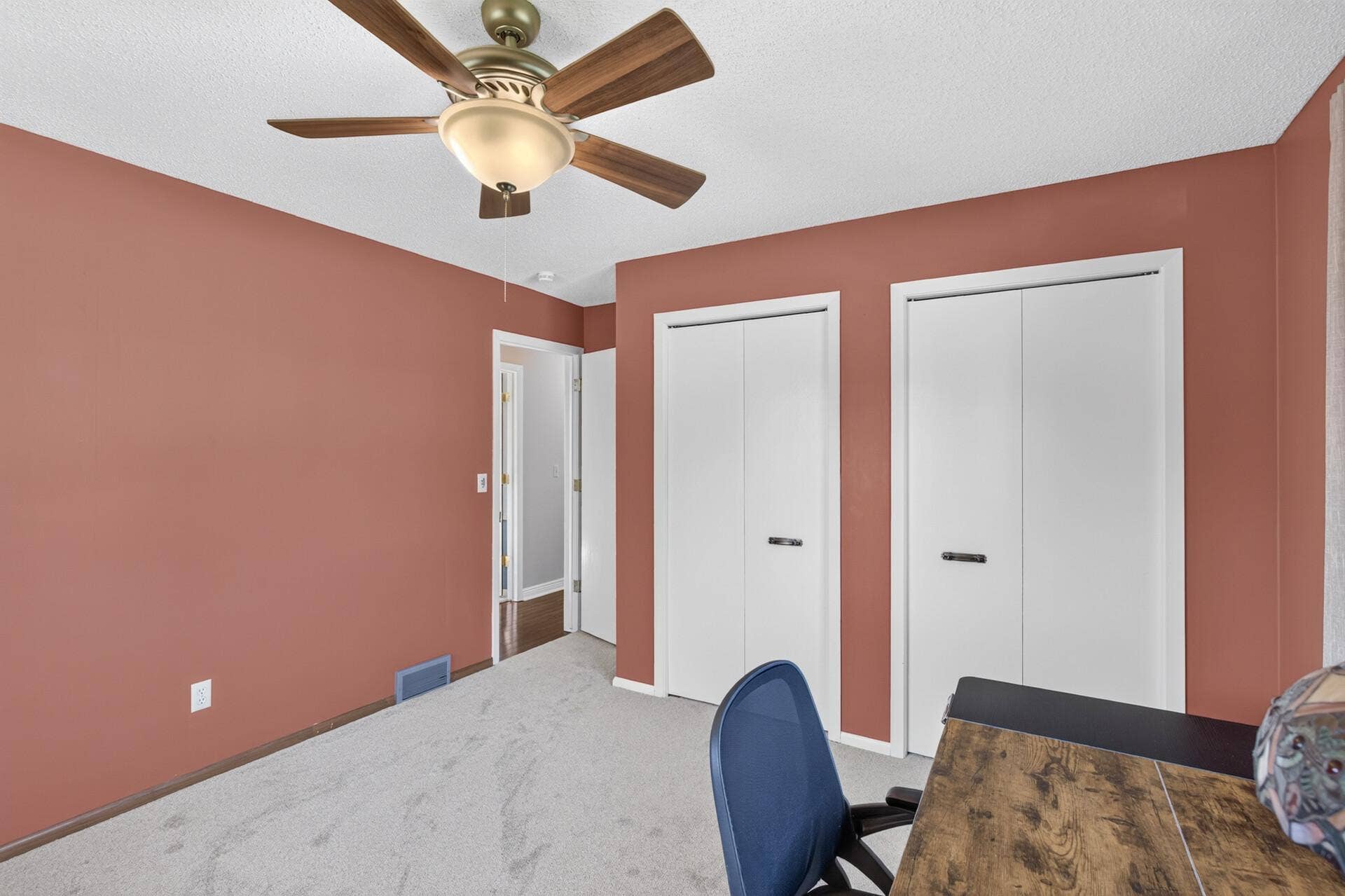 4315 Kaufmanis Way, Eagan, MN 55123 Comfortable bedroom with generous closet storage, ceiling fan and plenty of natural light