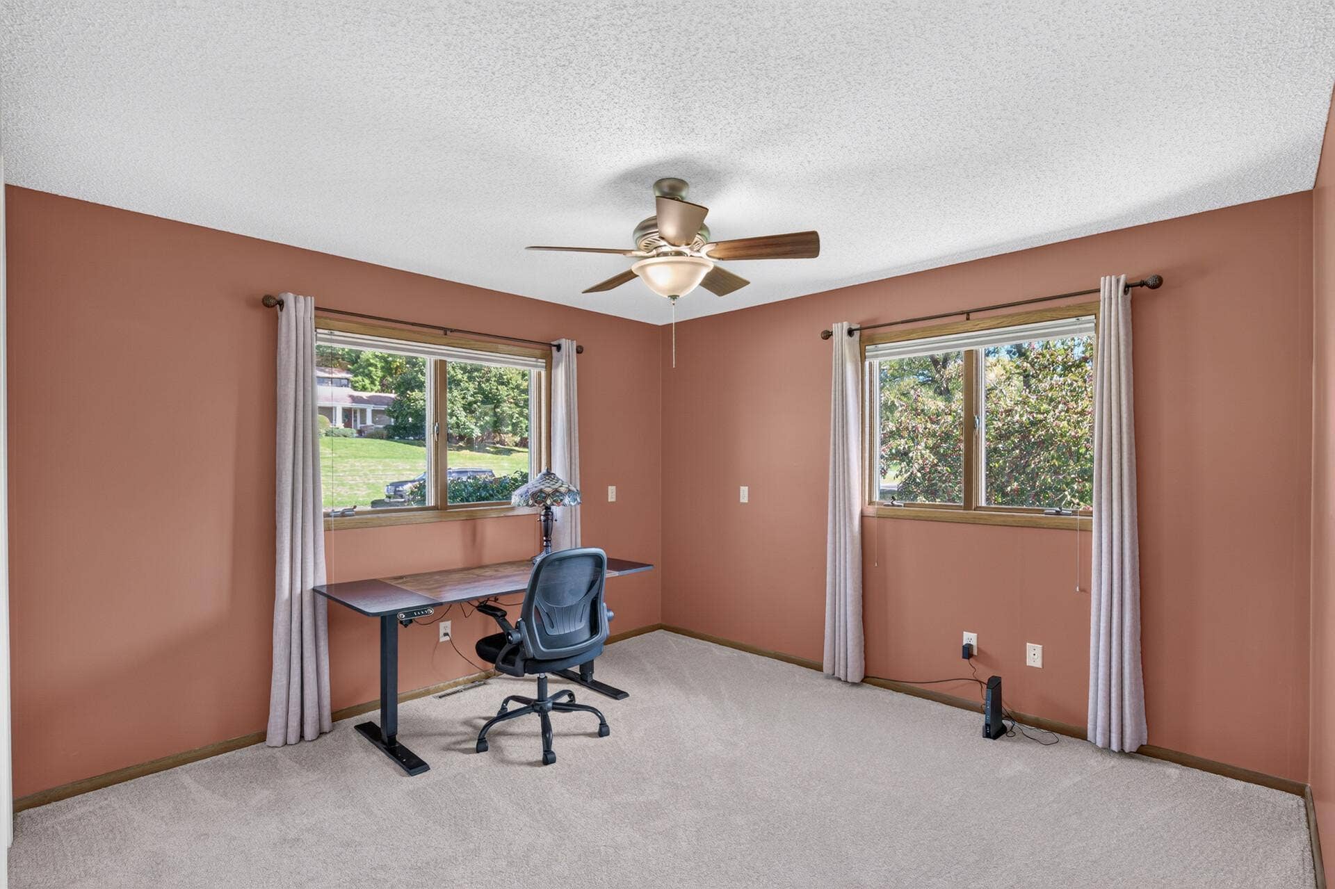 4315 Kaufmanis Way, Eagan, MN 55123 Spacious bedroom offers flexibility for a home office, guest room or additional living space, with windows on two sides