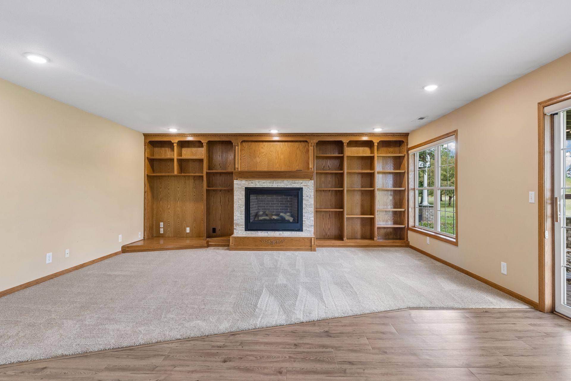 Family Room centered by cozy fireplace