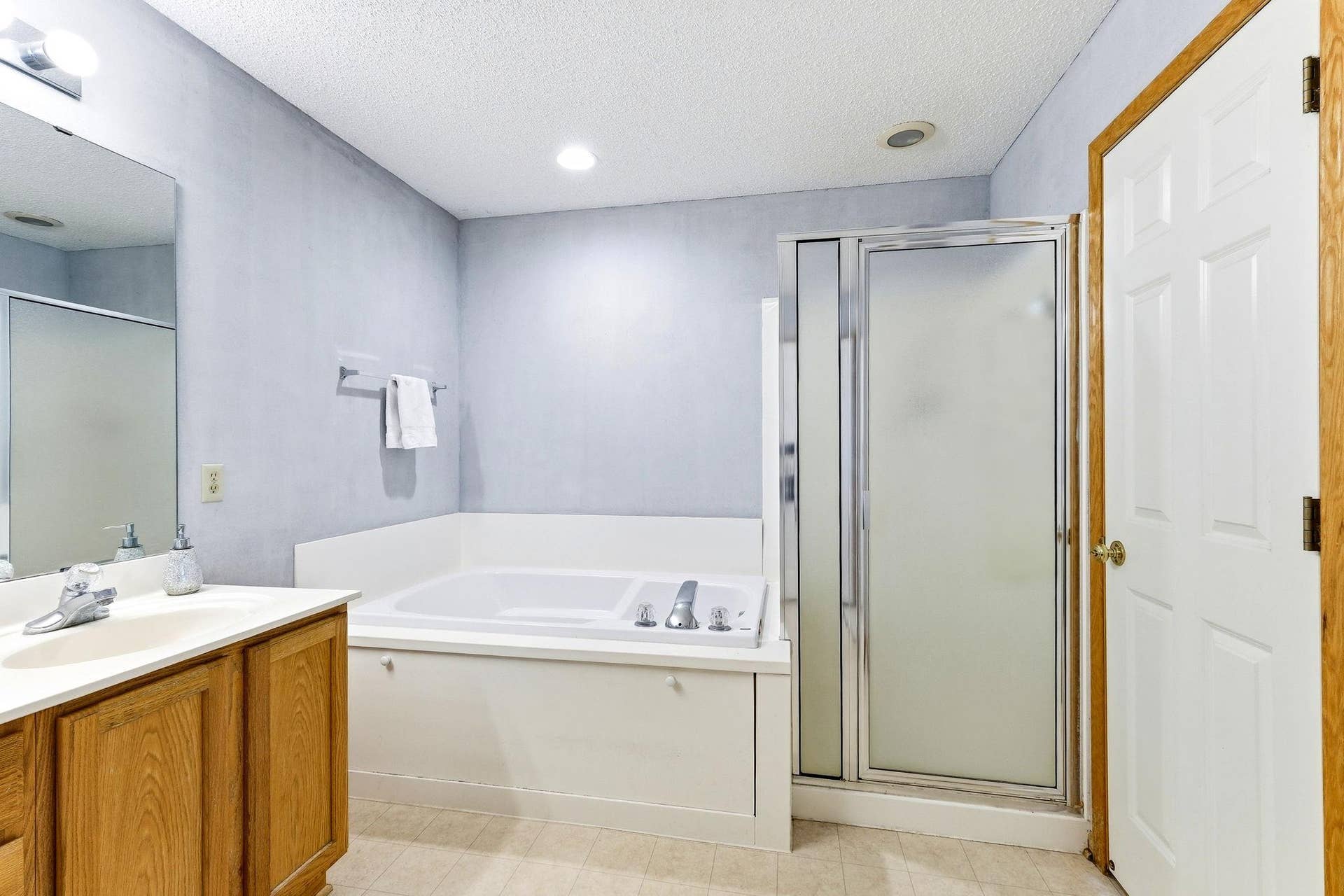 1899 Wildflower Court, Shoreview, MN 55126 Large soaking tub and separate shower stall.