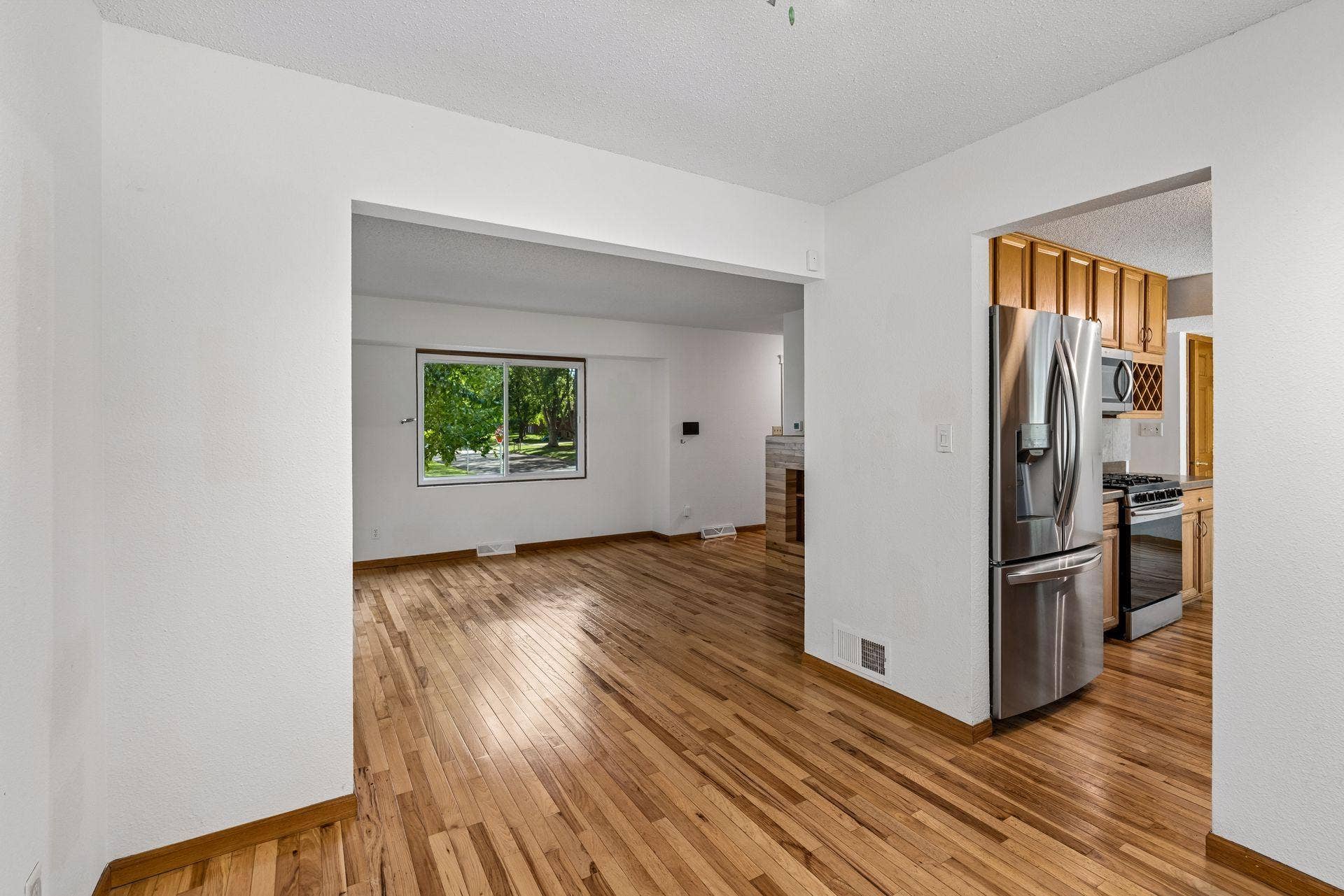 2841 Riviera Drive N, White Bear Lake, MN 55110 Connected living, dining, and kitchen spaces support everyday convenience.