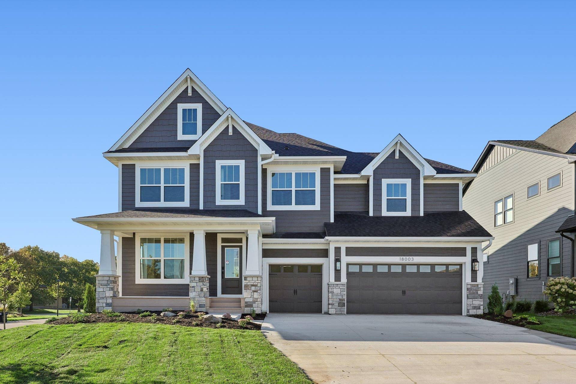 18003 101st Place N, Maple Grove, MN 55311 The WESLEY plan by Robert Thomas Homes! Completed and ready for a buyer.