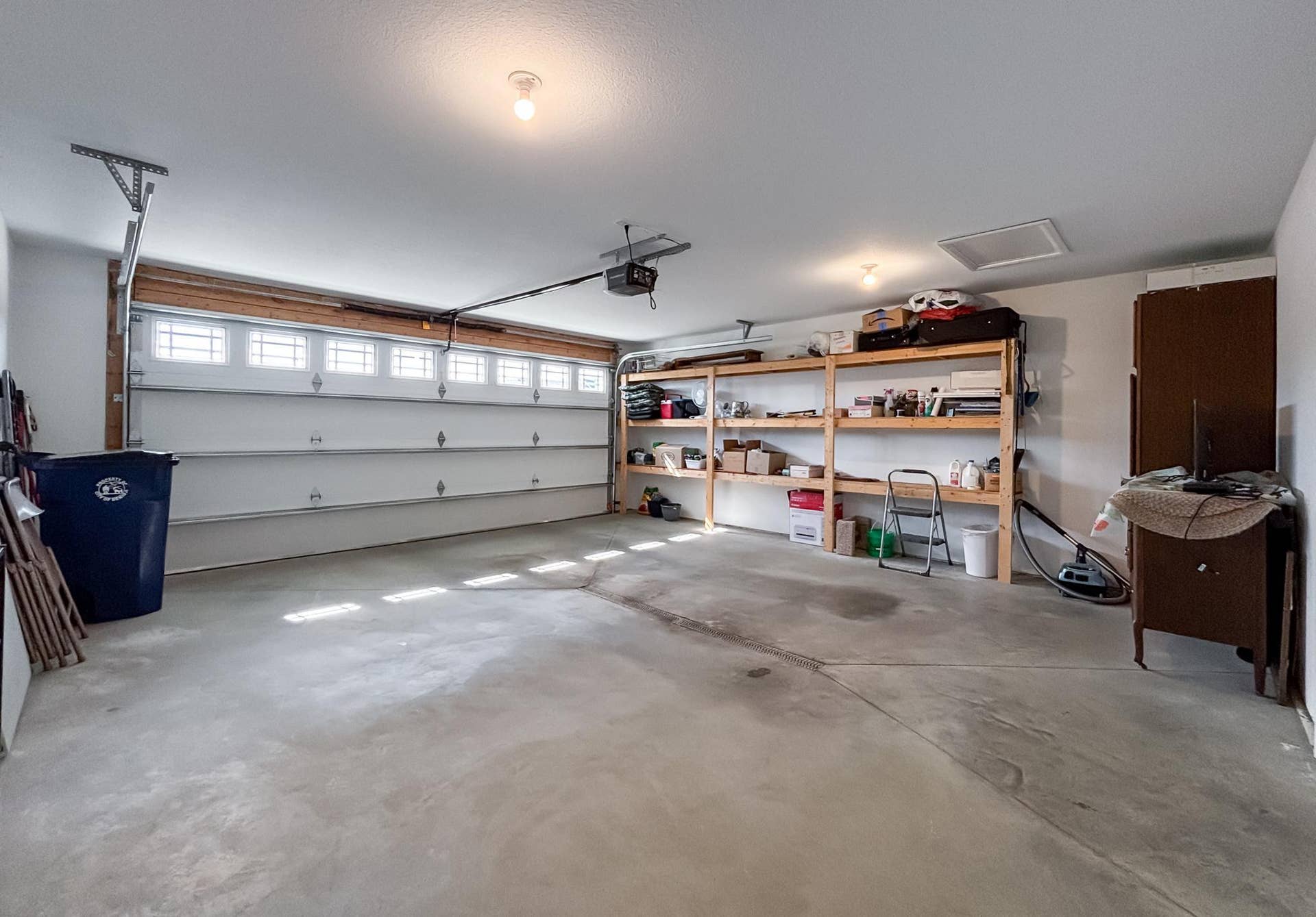 1615 30th Street NW, #17, Bemidji, MN 56601 17-Garage-Toward-Overhead-Door-And-Shelving.jpg