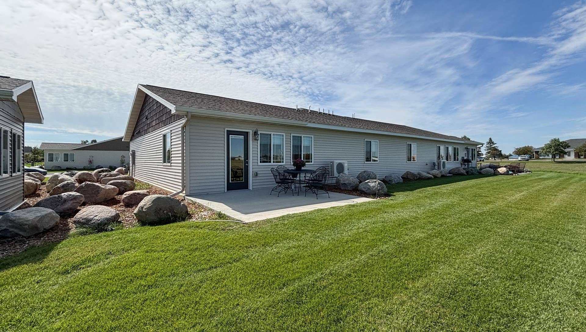 1615 30th Street NW, #17, Bemidji, MN 56601 13-Rear-Exterior-And-Lawn.jpg