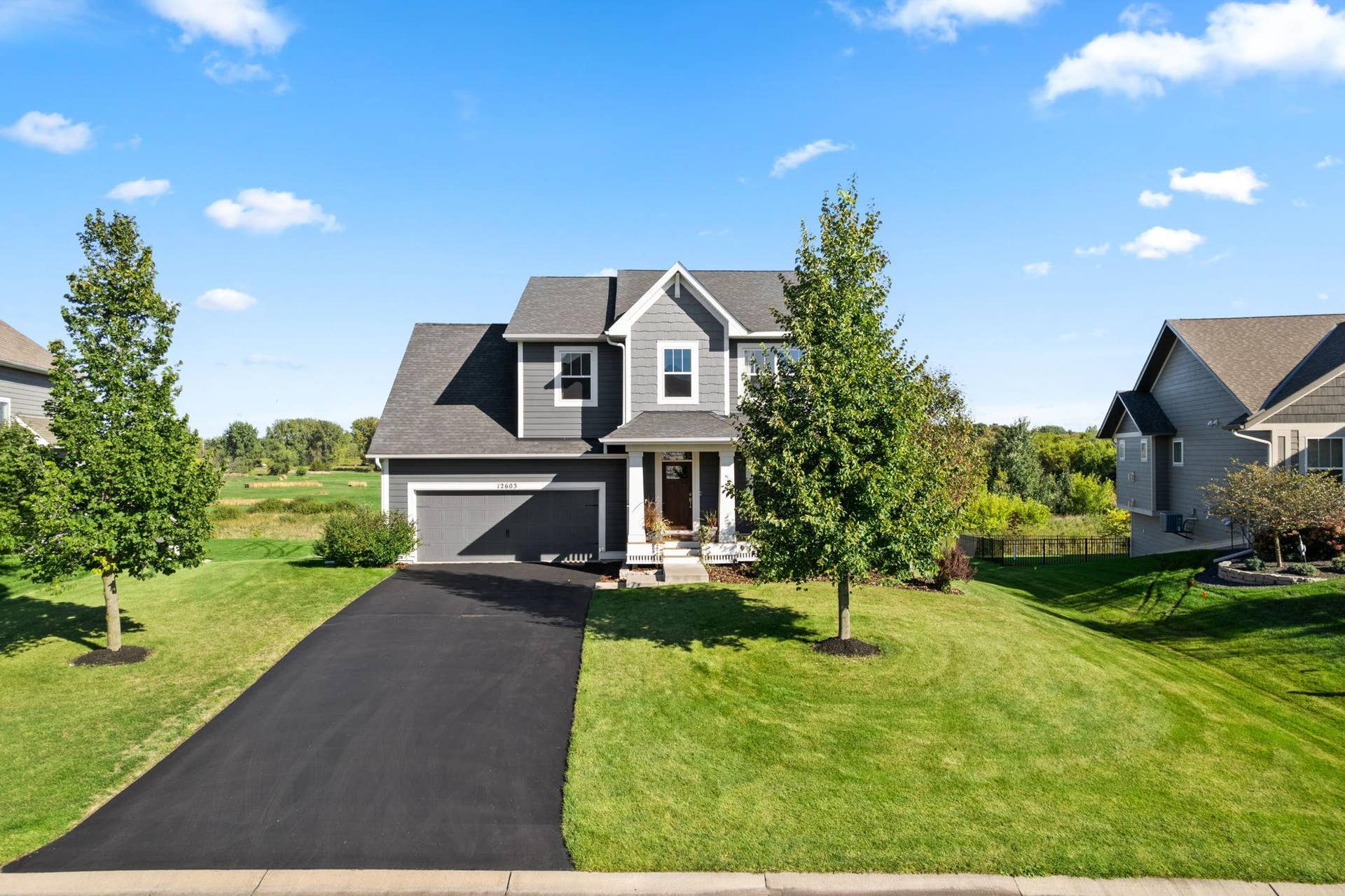 Welcome Home to 12603 Foxhill Ave N!